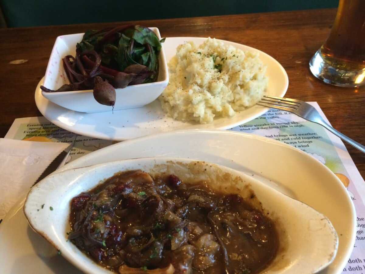 wild game with mashed potatoes and salad at White Wolf Inn, Stratton, Maine