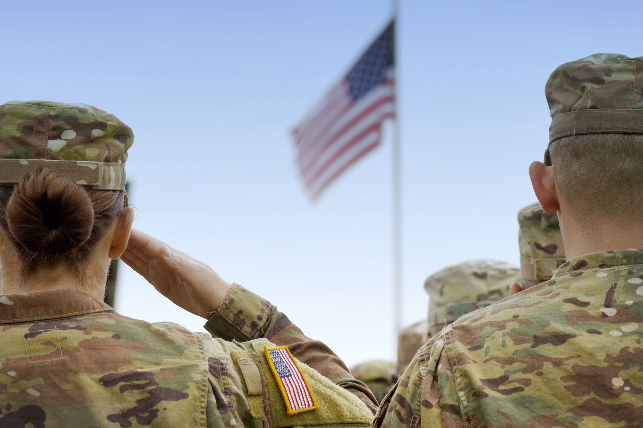 American Soldiers Saluting US Flag