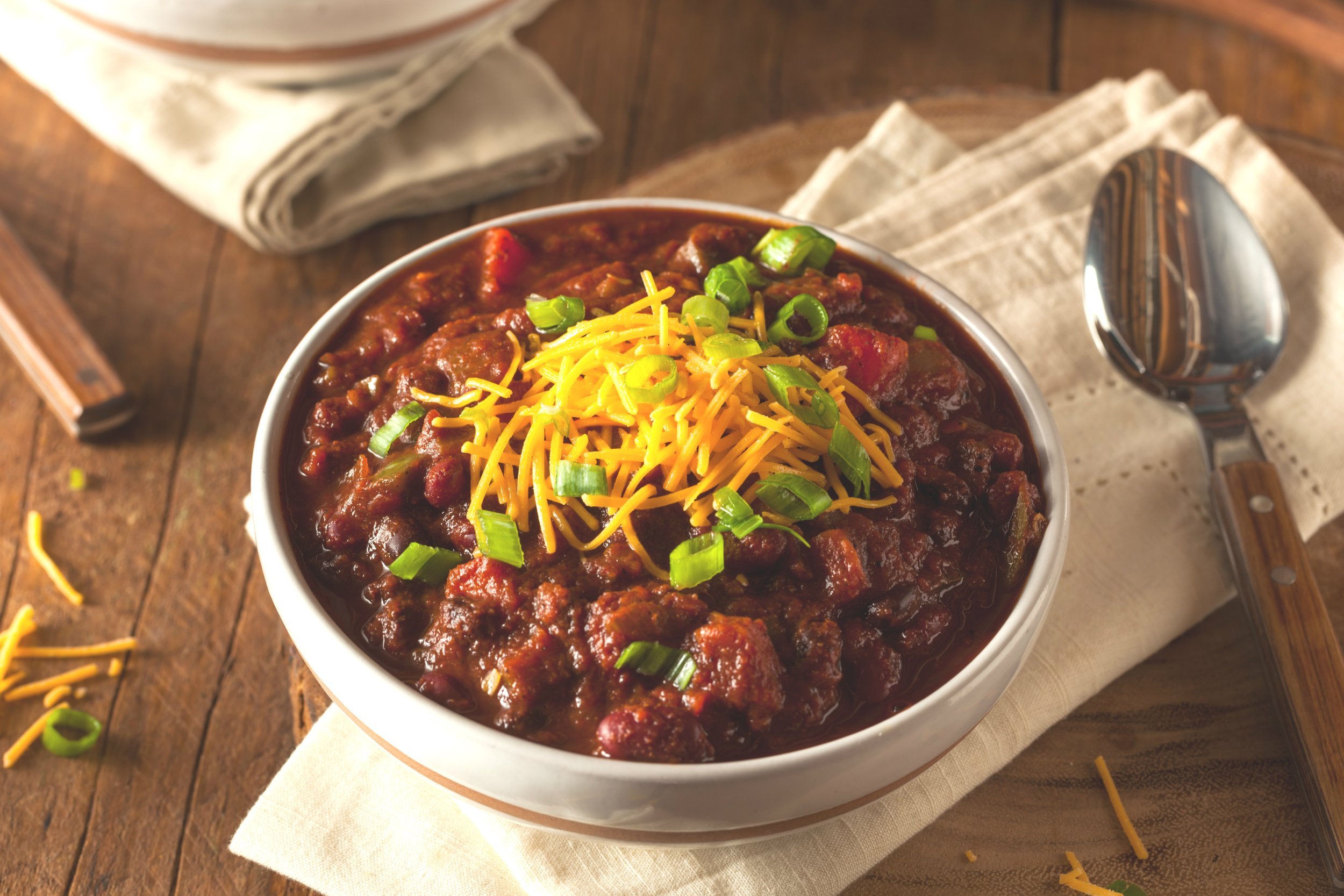 homemade organic vegetarian chili with beans and cheese