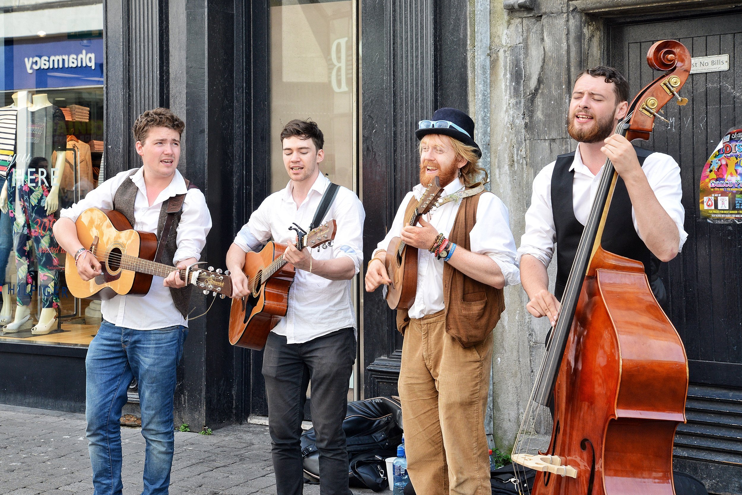 buskers performing music on the streets of Galway, Ireland