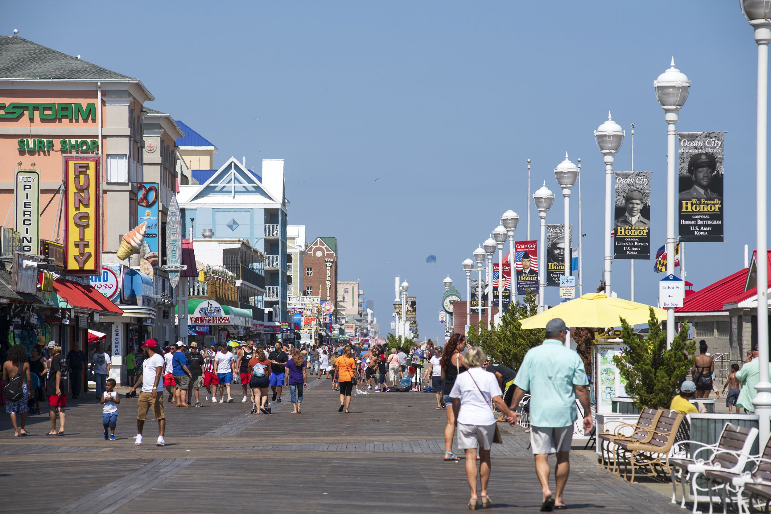 visitors walking on boardwalk at Ocean City, Maryland