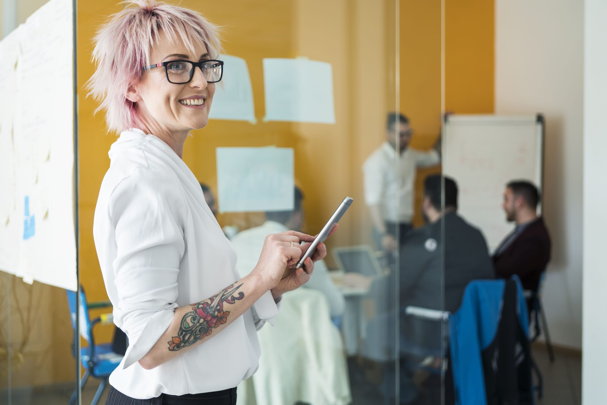 business woman with a tattoo on her arm