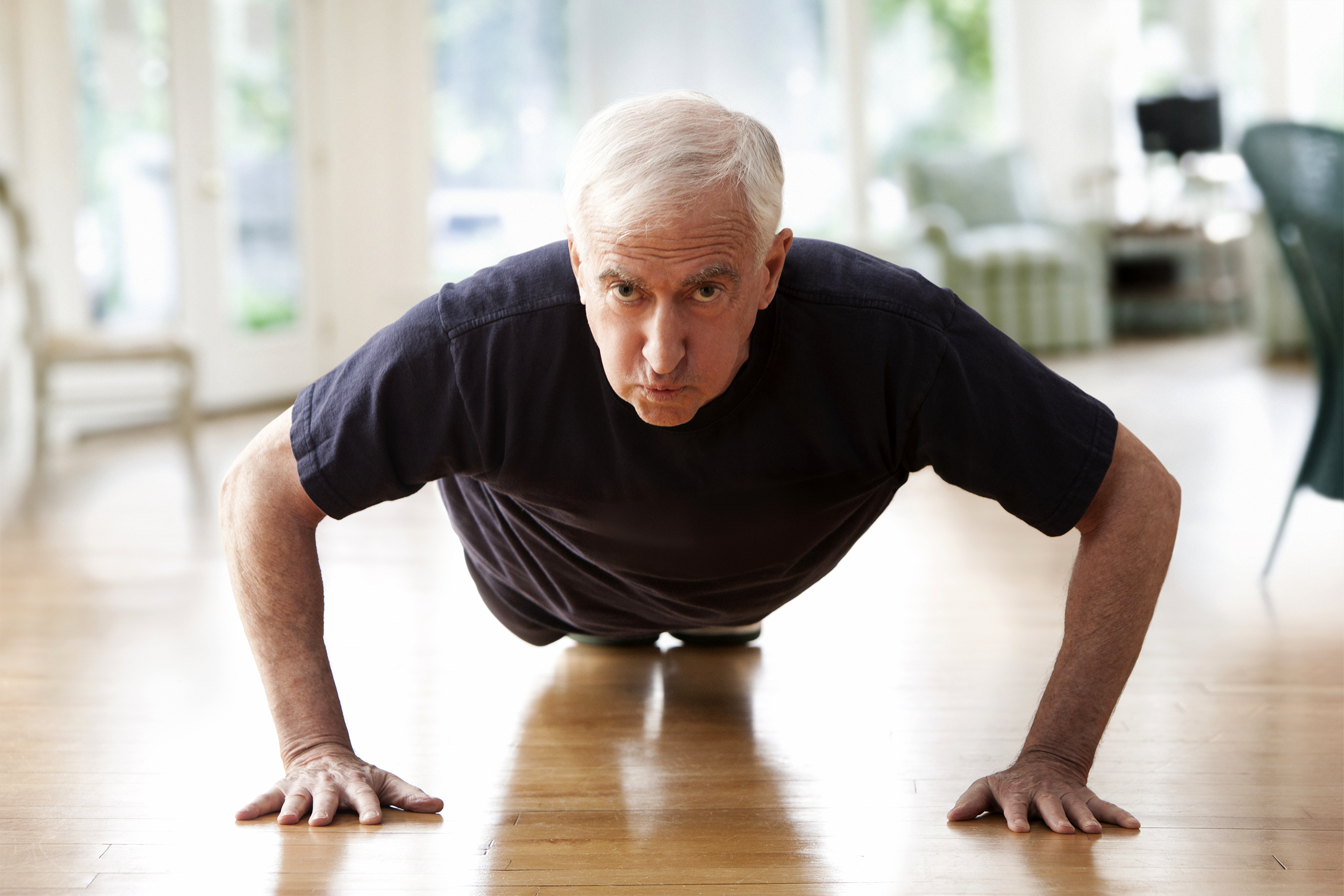 Senior man doing pushups
