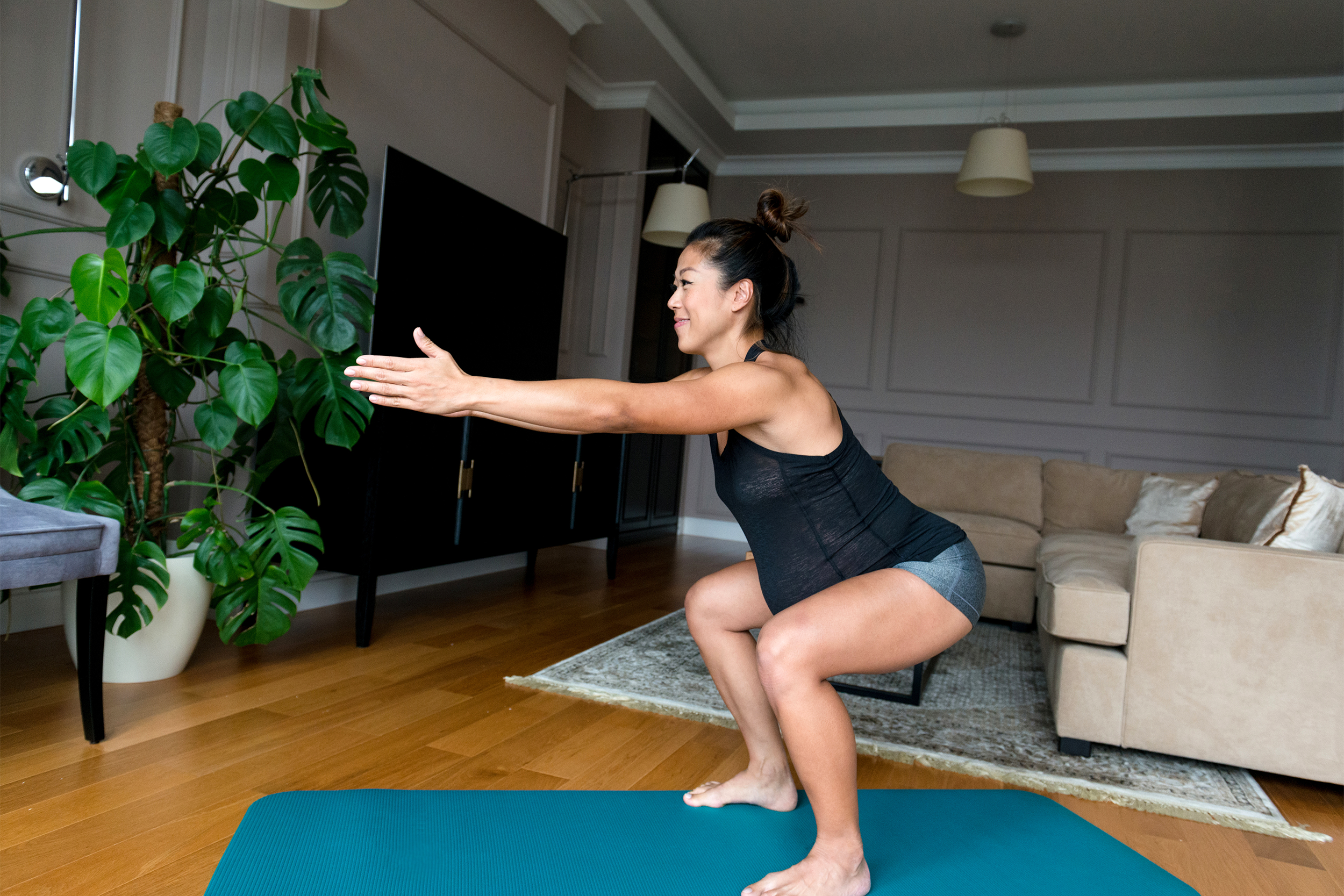 Woman exercising at home