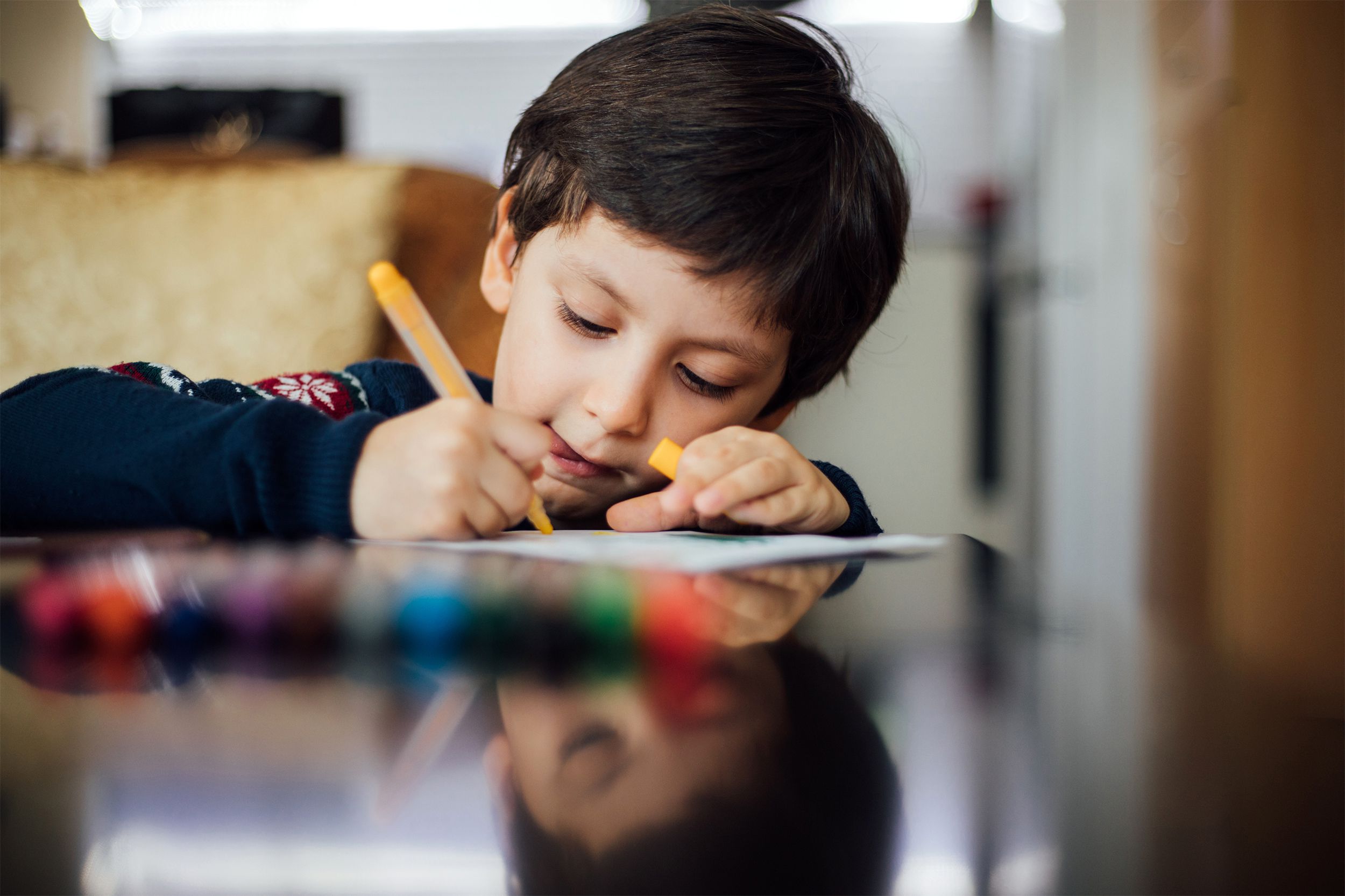 little boy writing