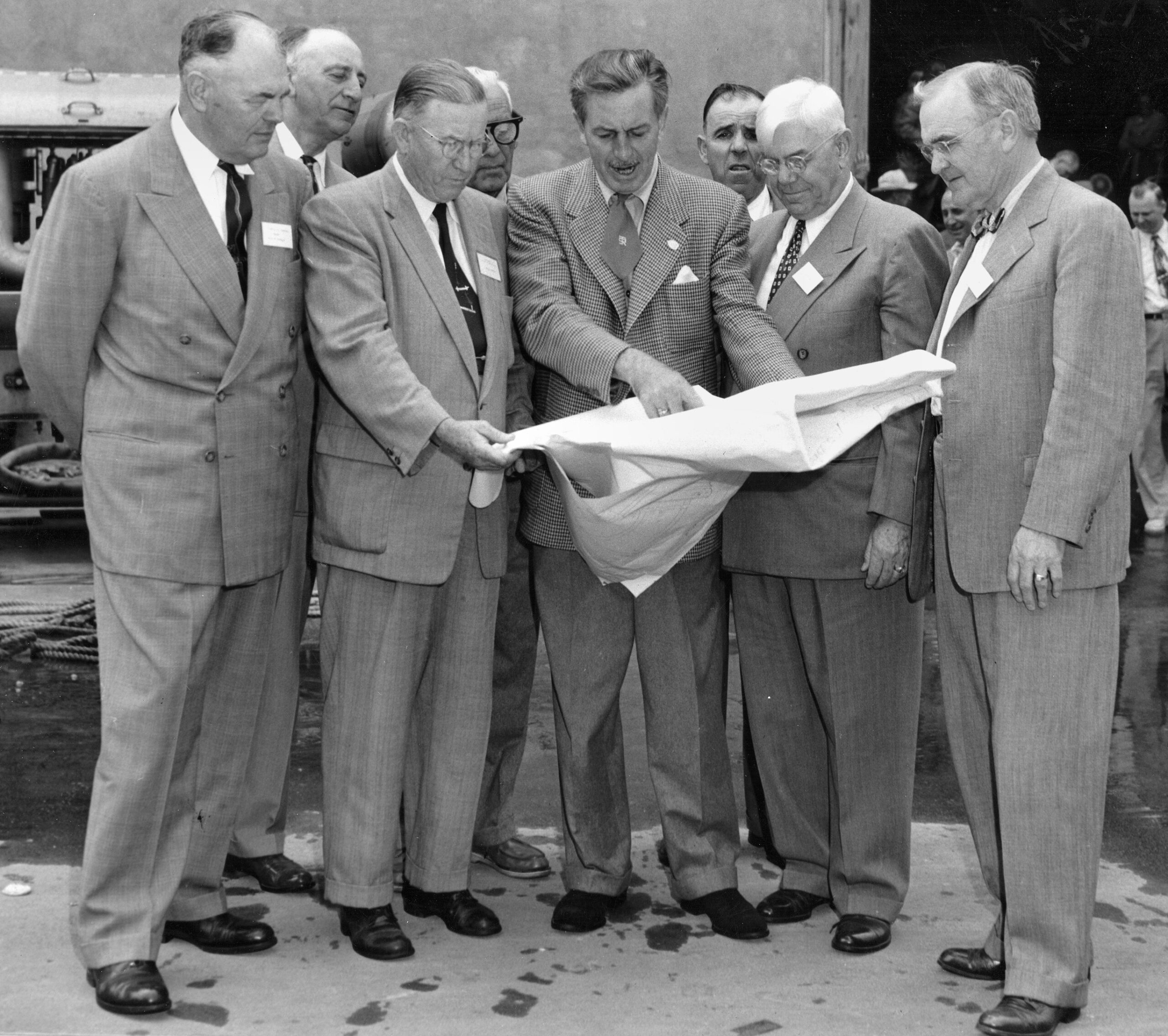 Walt Disney shows Disneyland plans