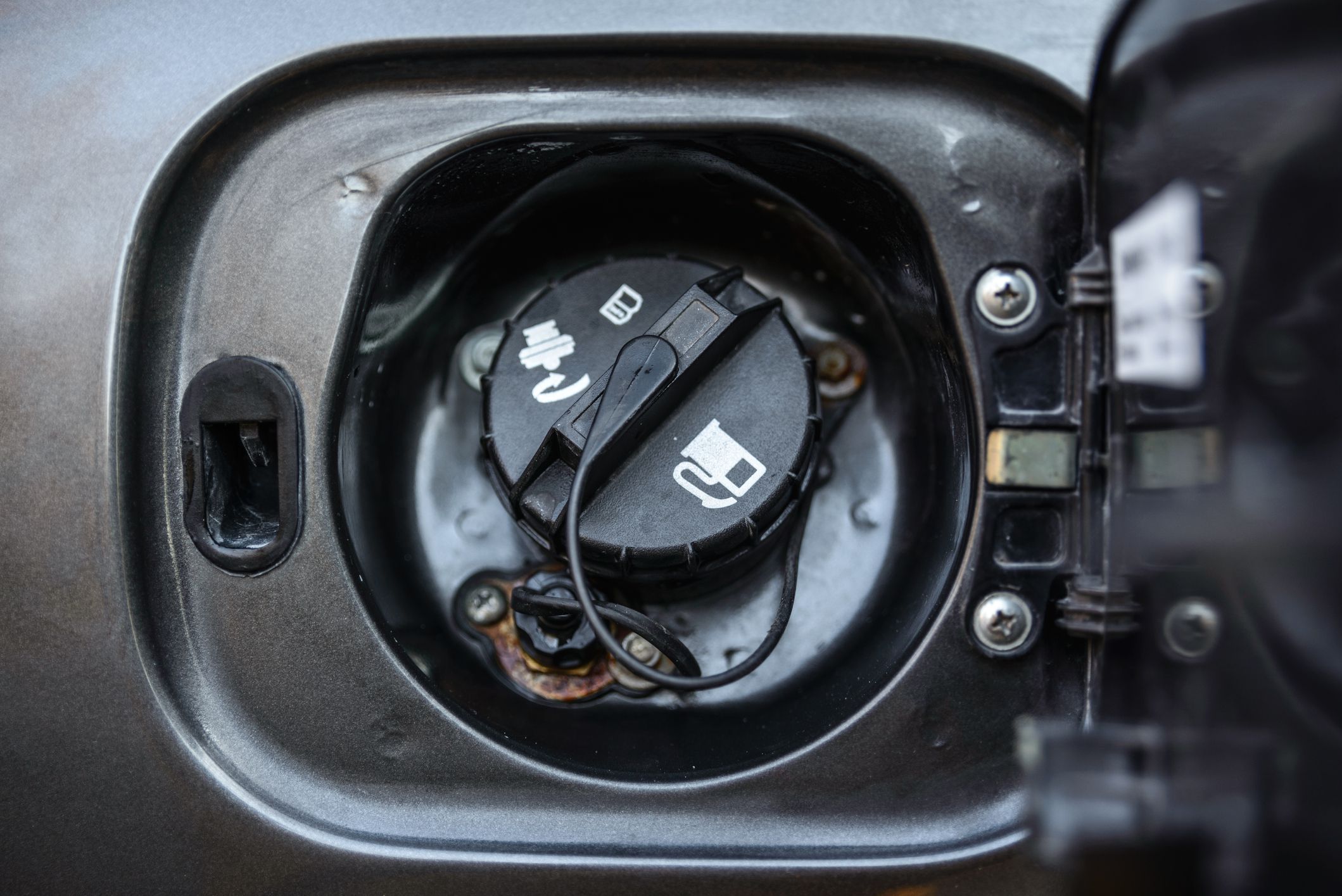 Close up of open gas lid on the car