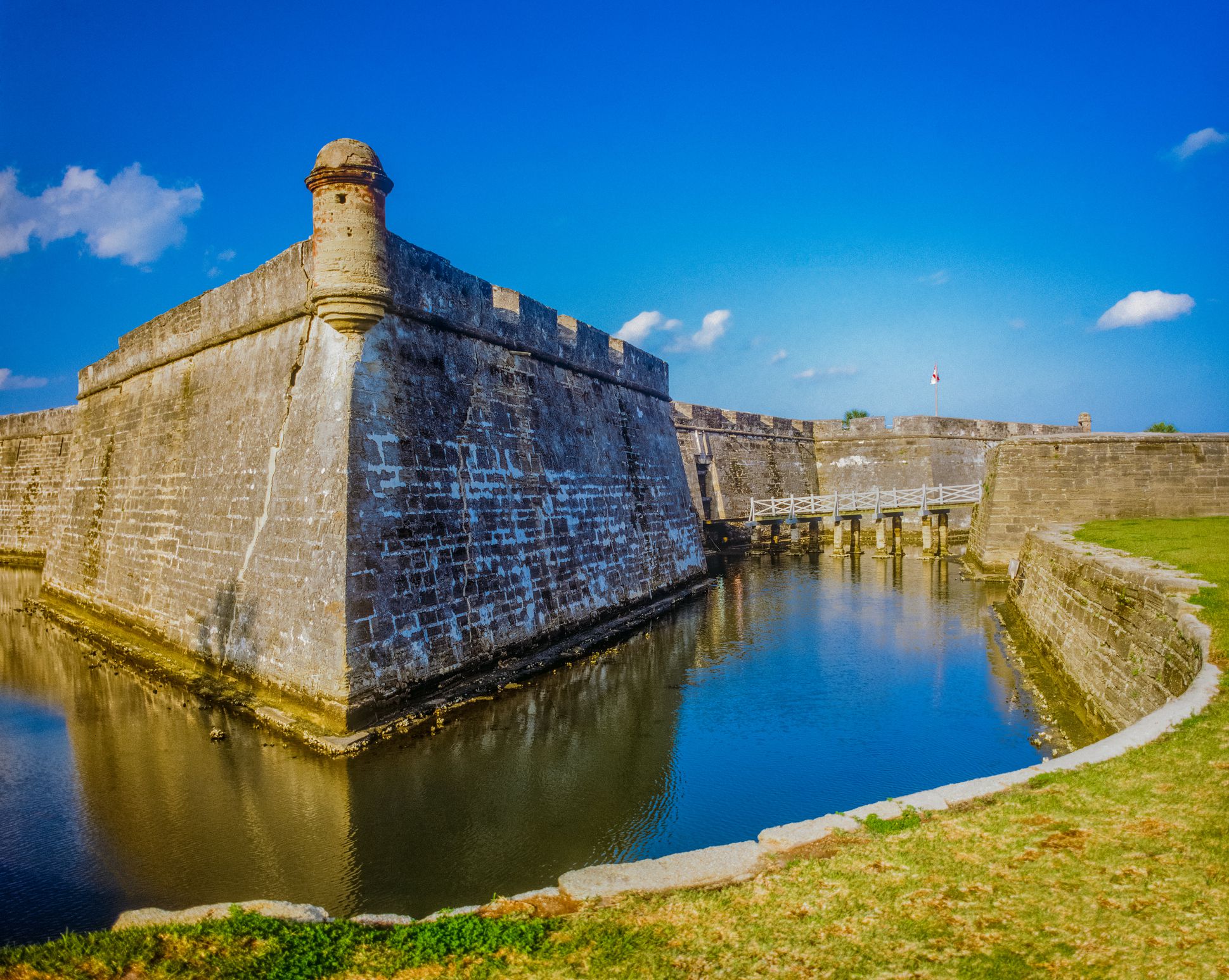 Water filled moat surrounds the Castillo De San Marcos National Monument, Florida,