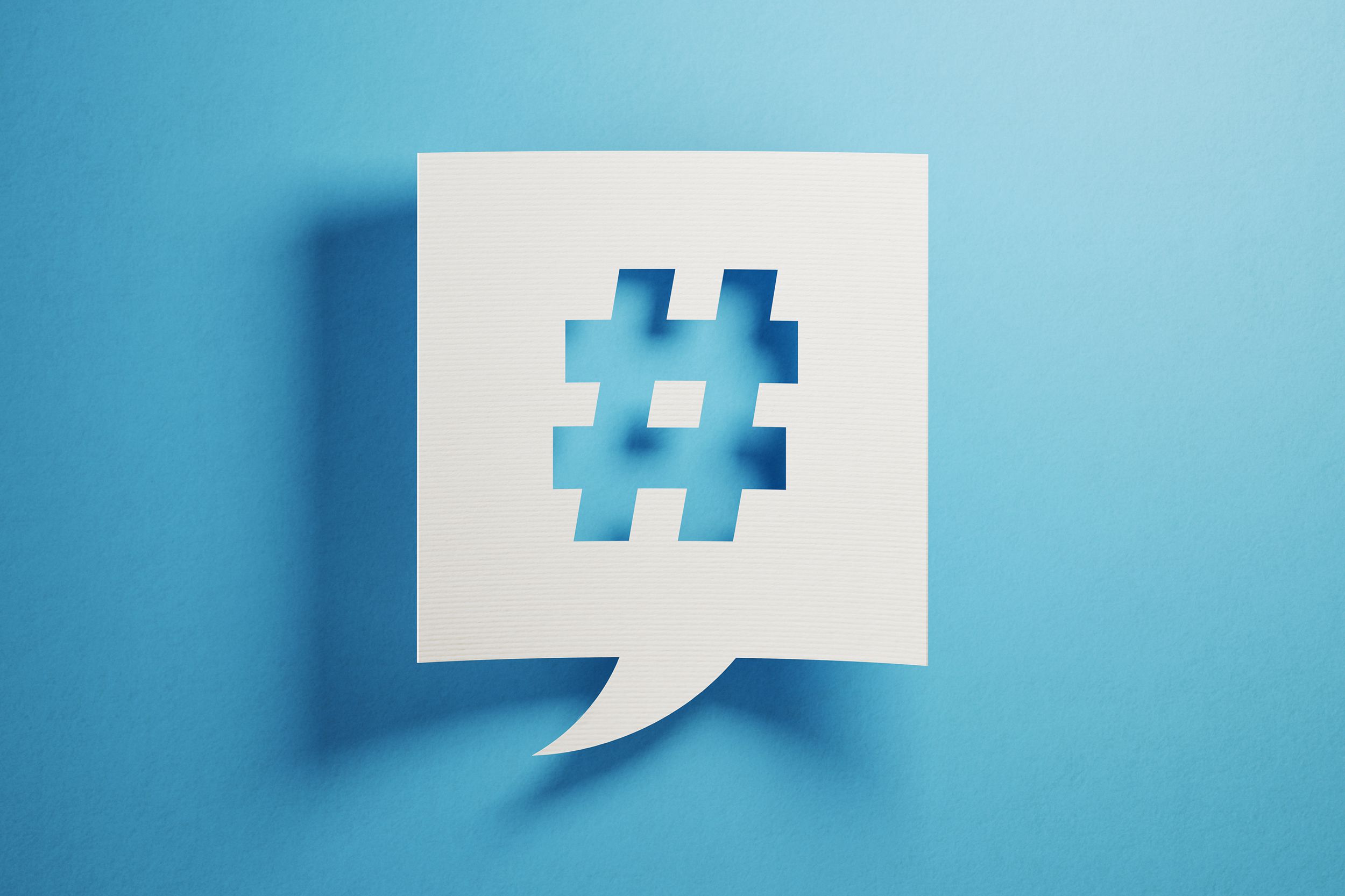 white chat bubble on blue background