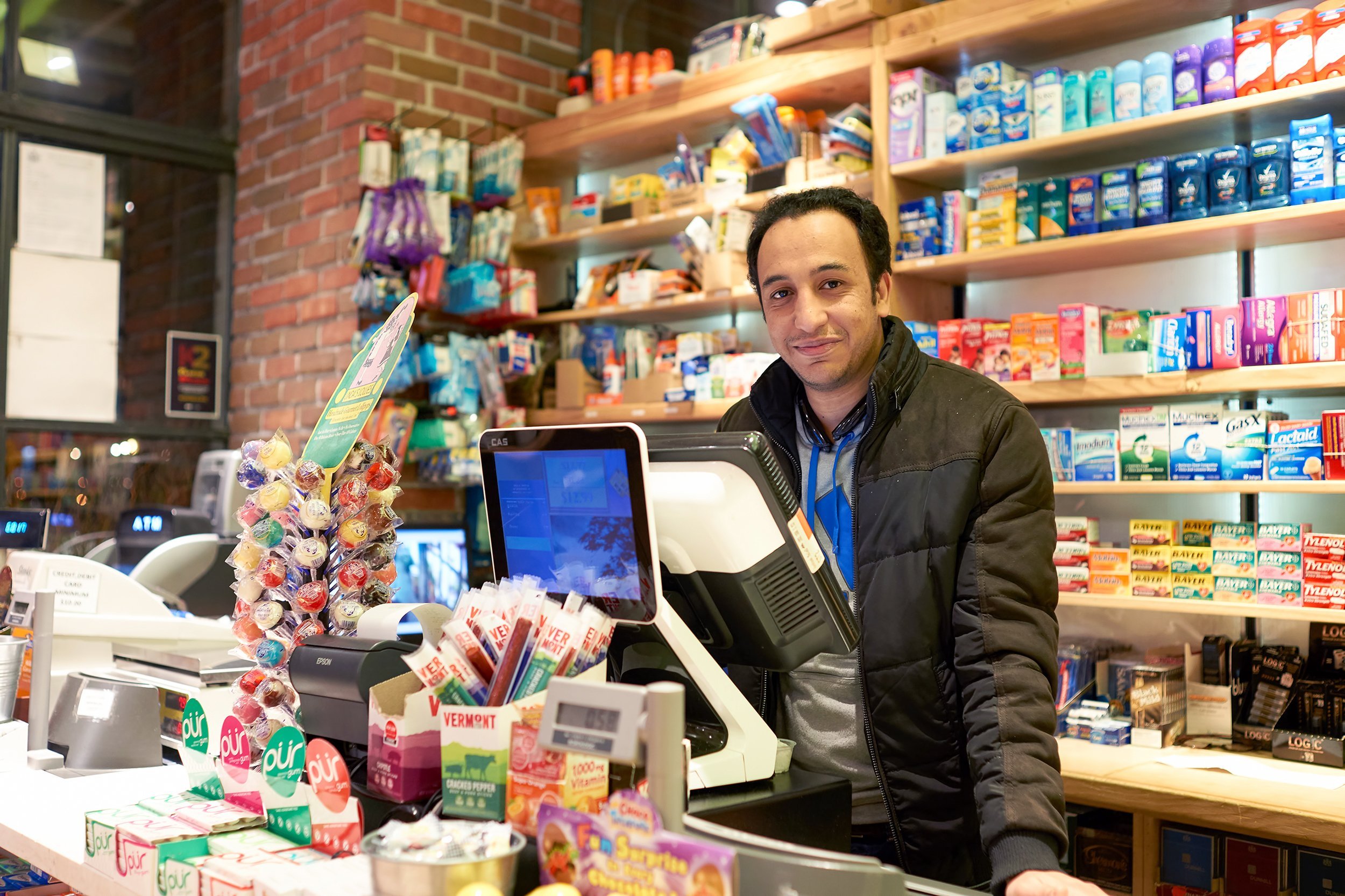 cashier inside NYC bodega