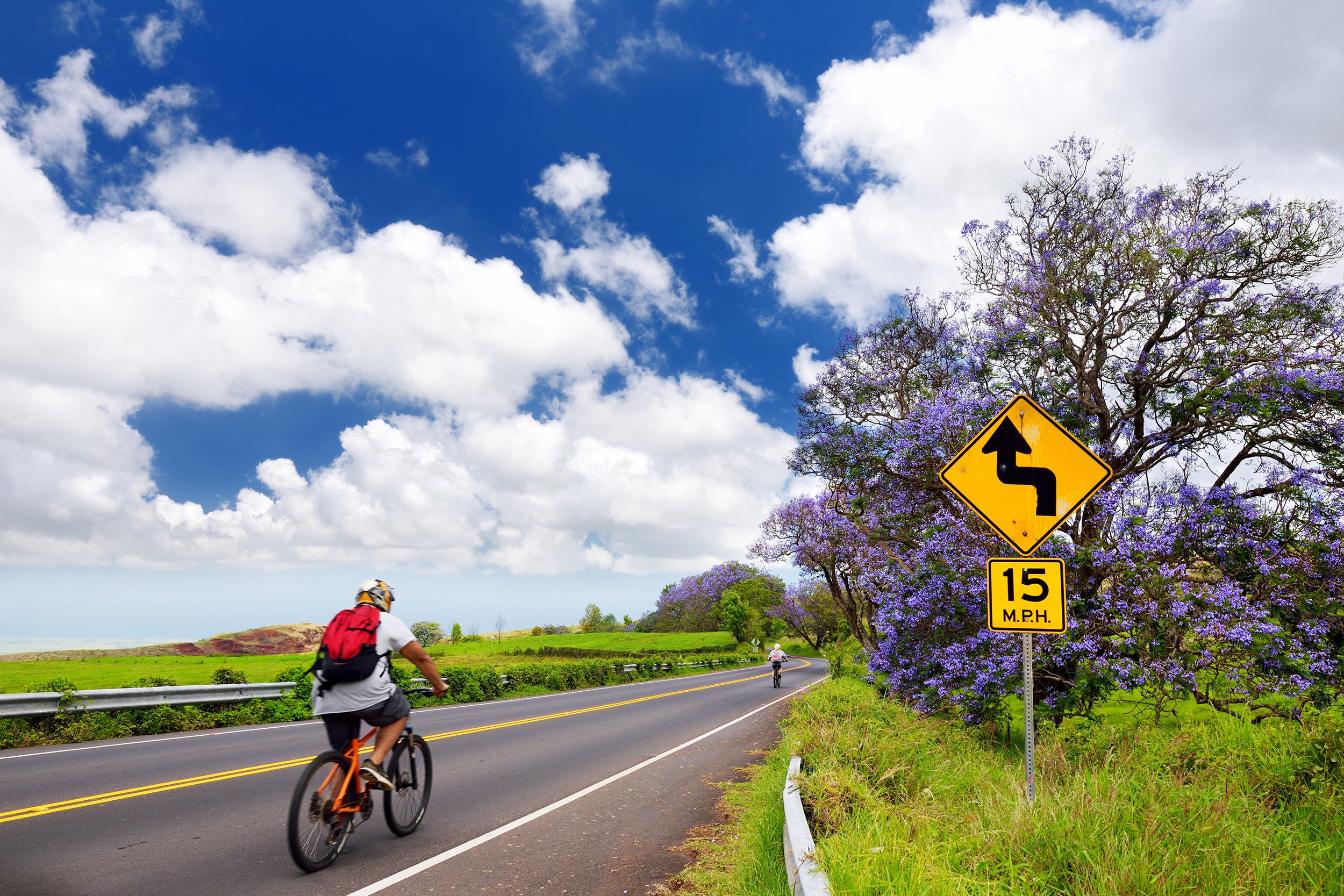 person biking along the roads of Maui island, Hawaii