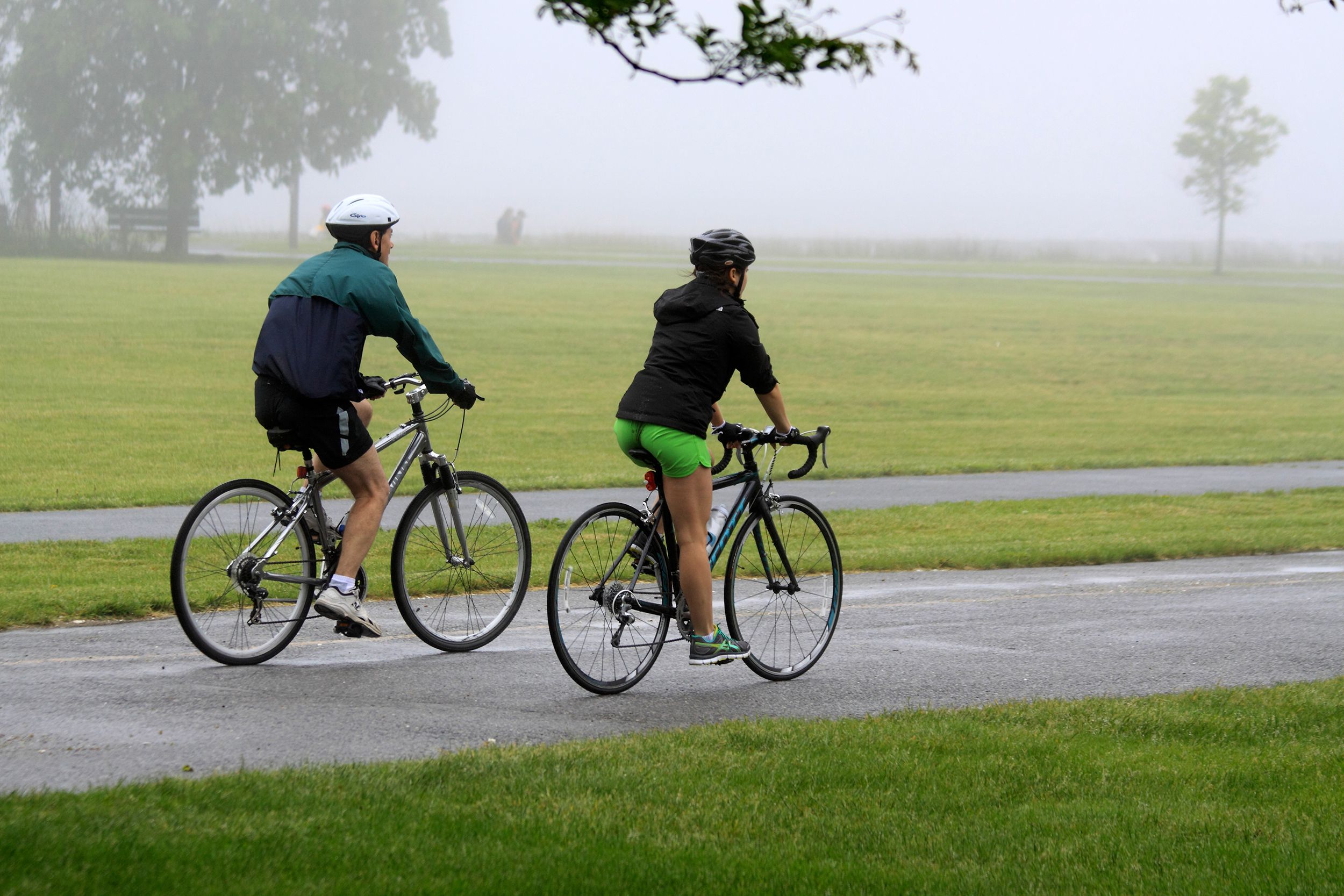 man and a woman on their bikes at the city Cove Island Park, Stamford, Connecticut