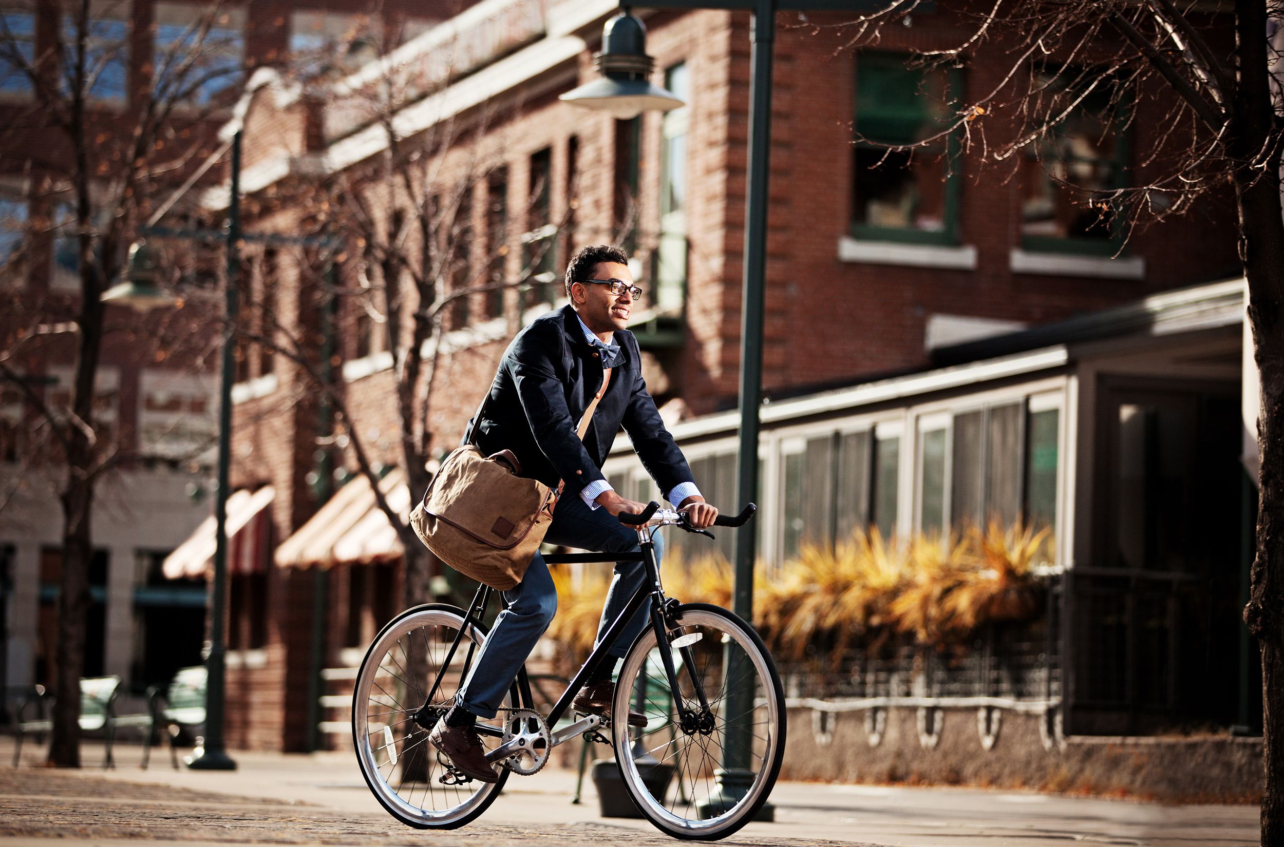 cyclist on his way to work in downtown Denver, Colorado