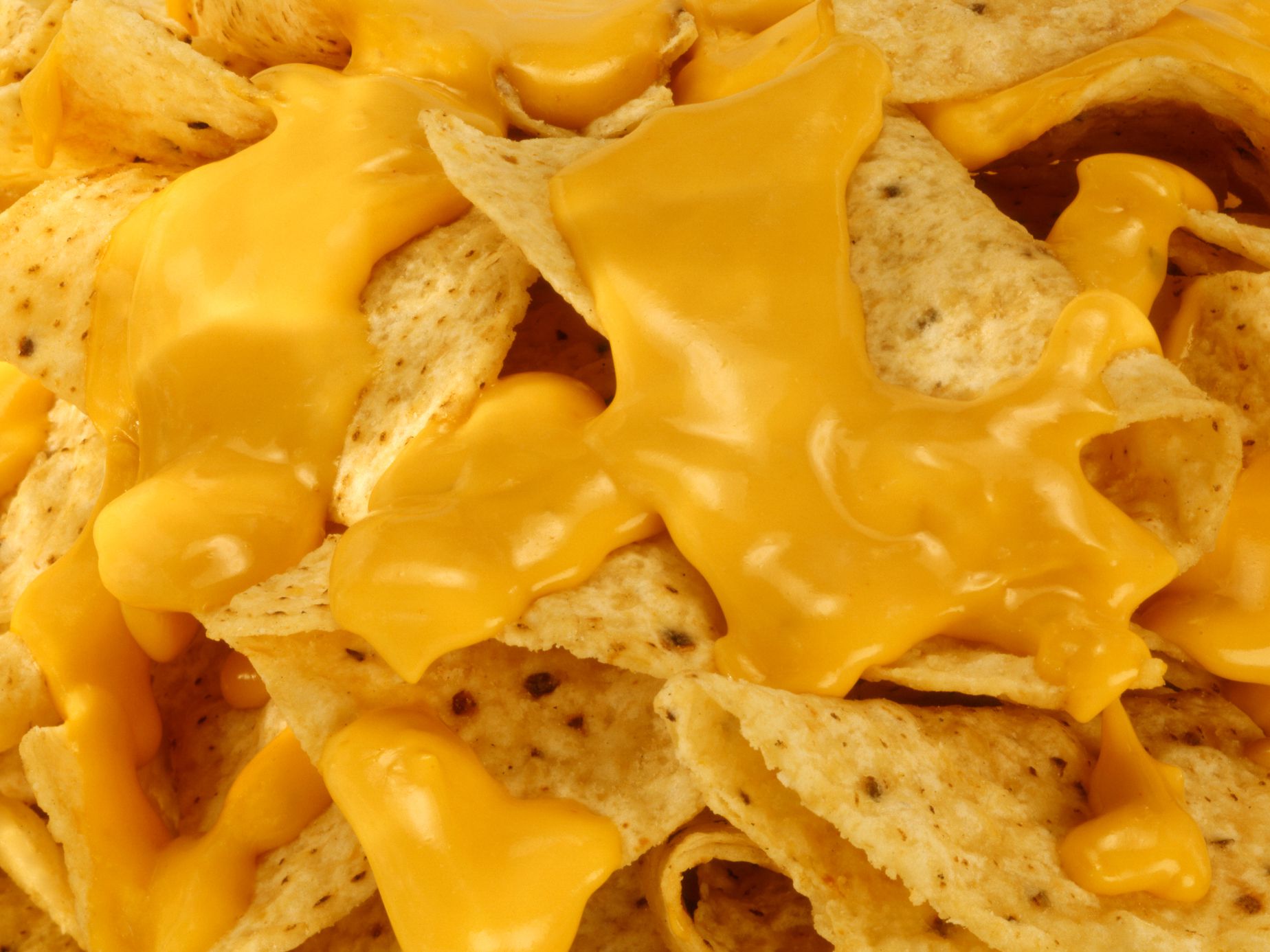 Restaurant style nachos and melted cheese.