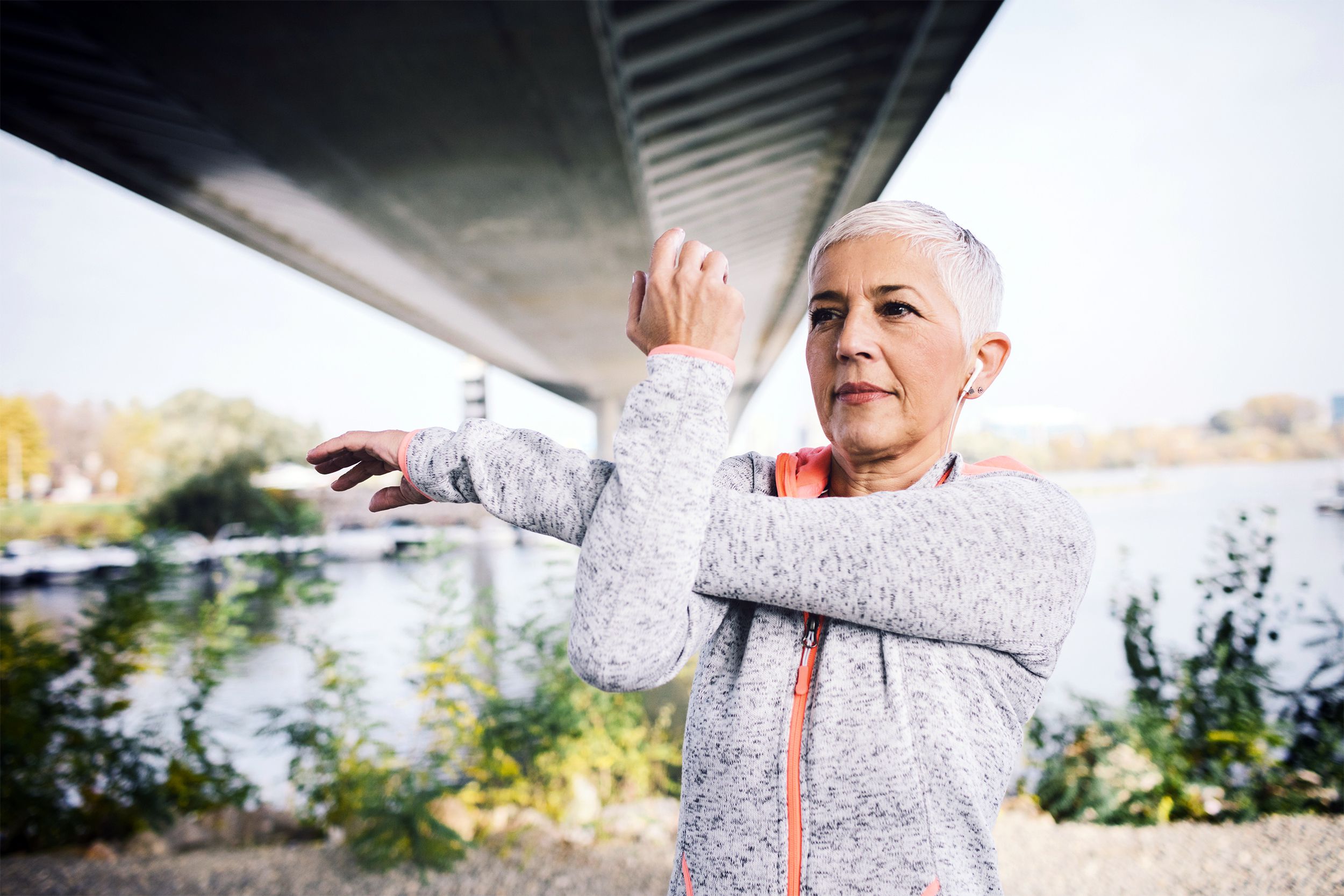 Woman stretching her arm and shoulder