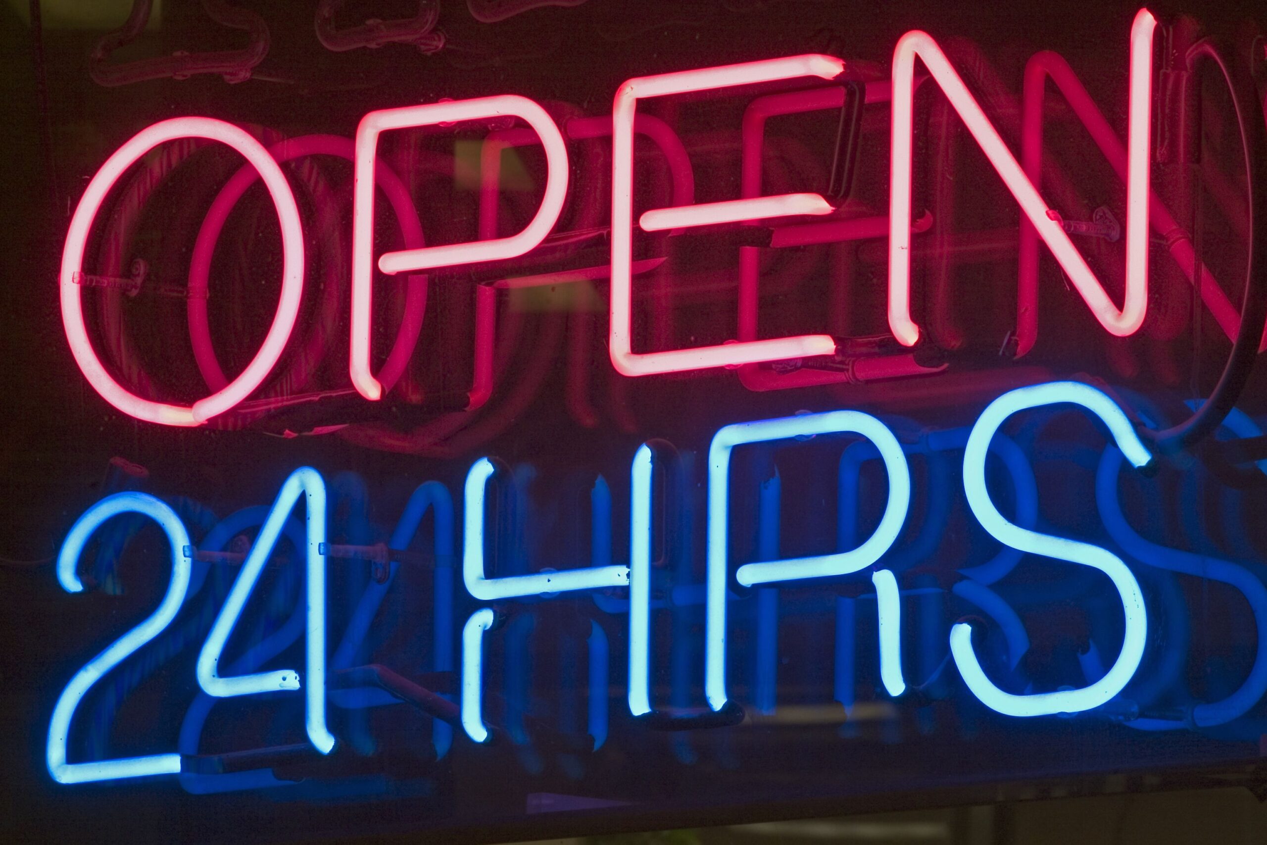open 24/7 neon sign