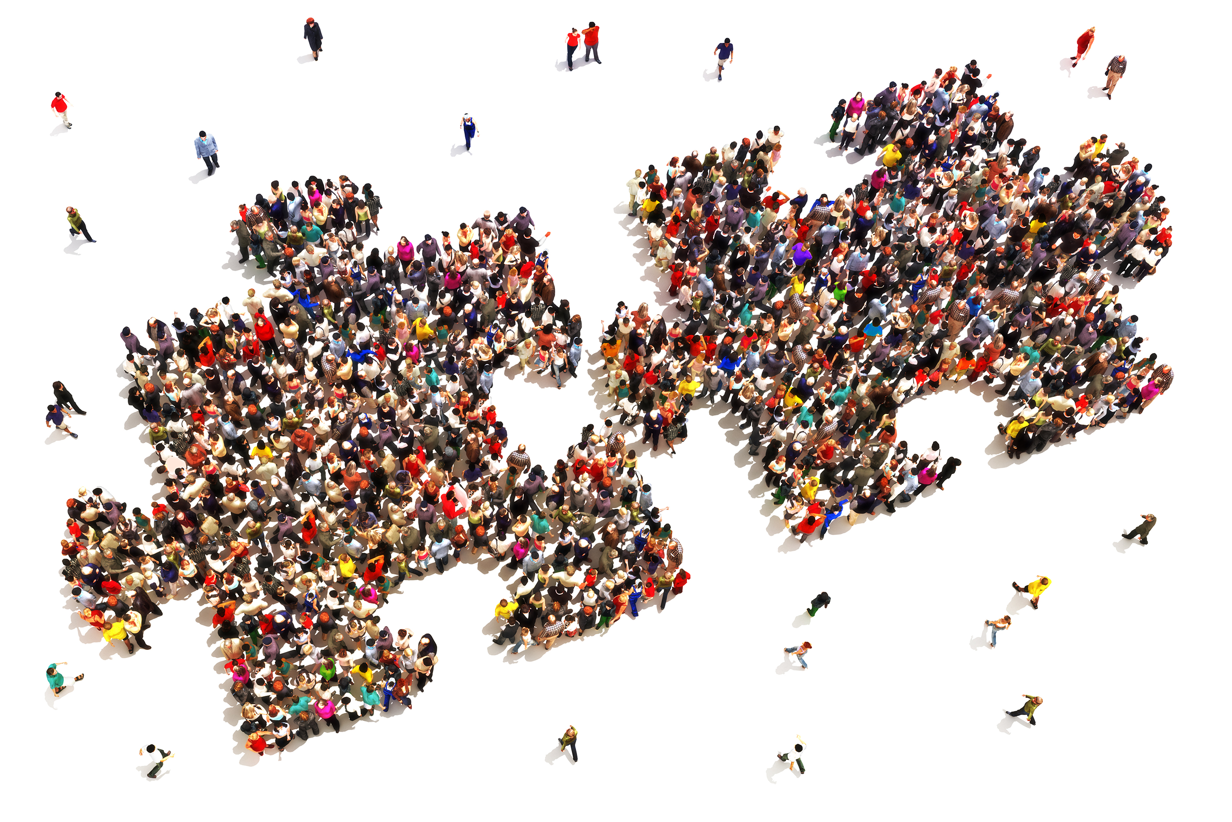 group of people standing together to create a giant puzzle piece