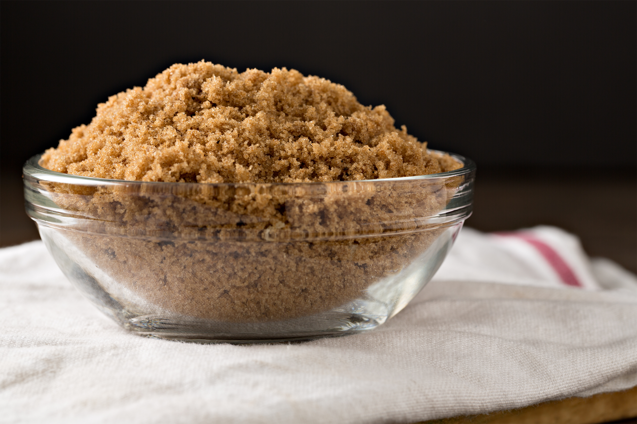 bowl of brown sugar on a white kitchen towel