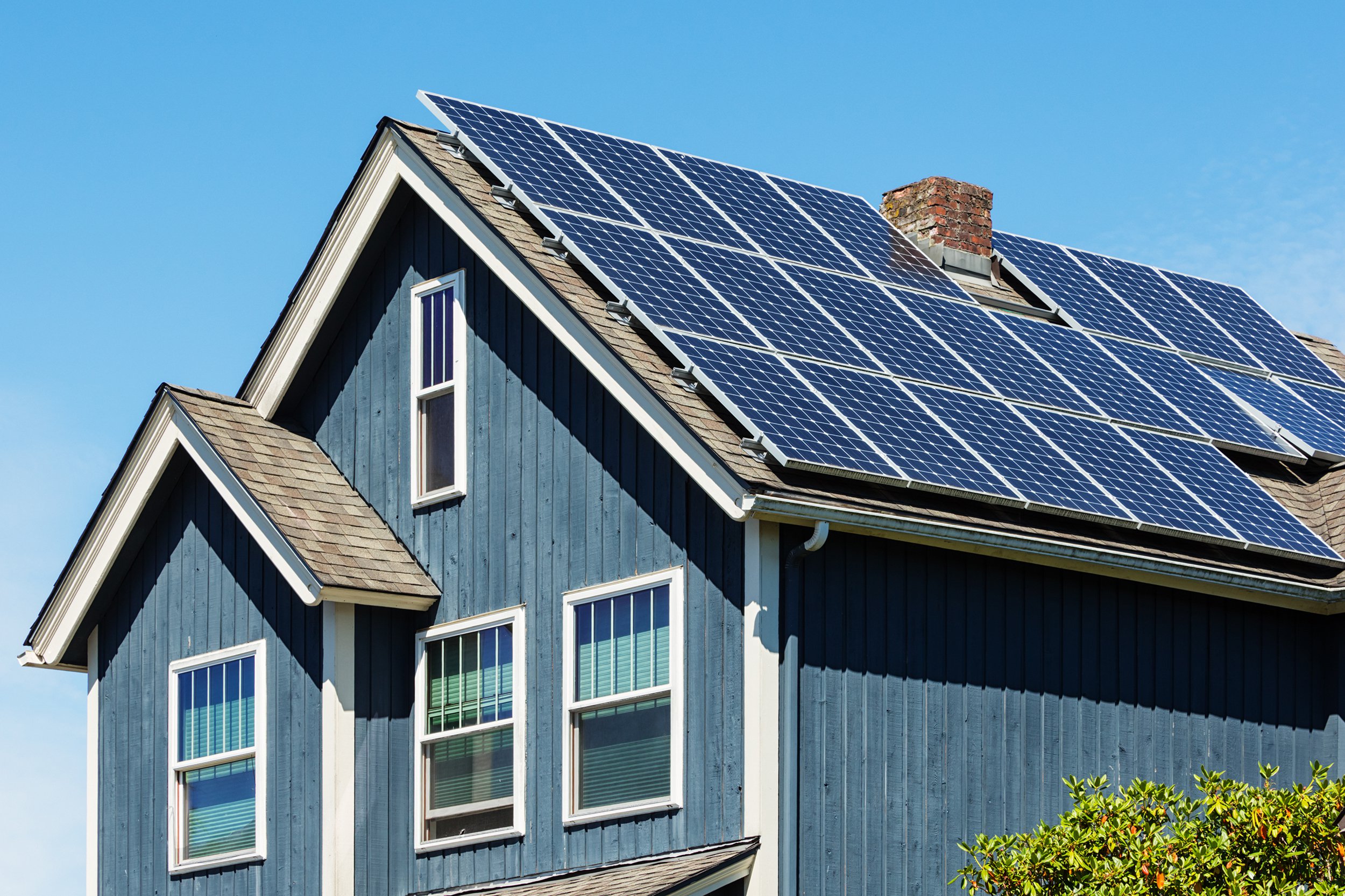 home with modern solar panels on roof