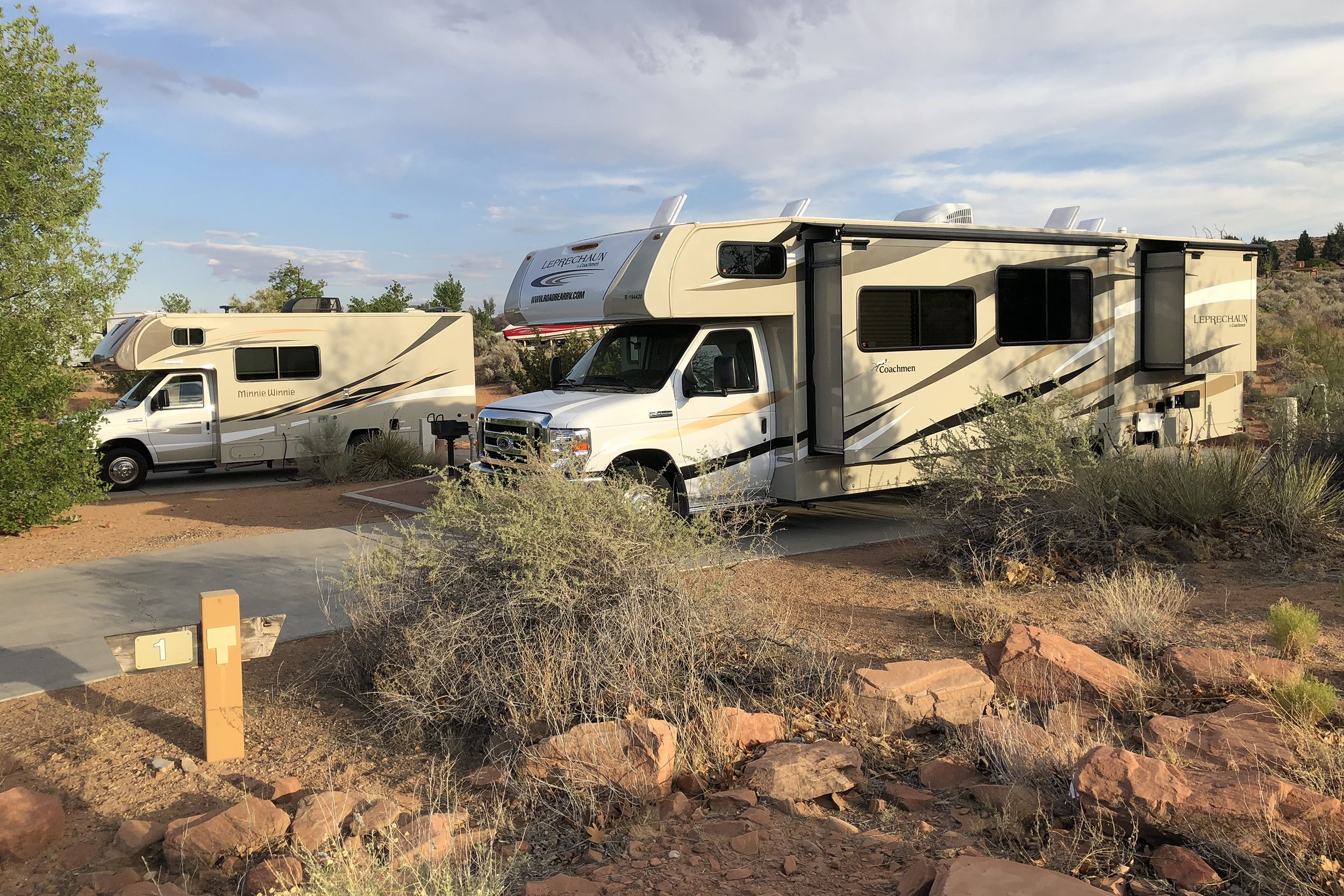 two RVs parked in campground