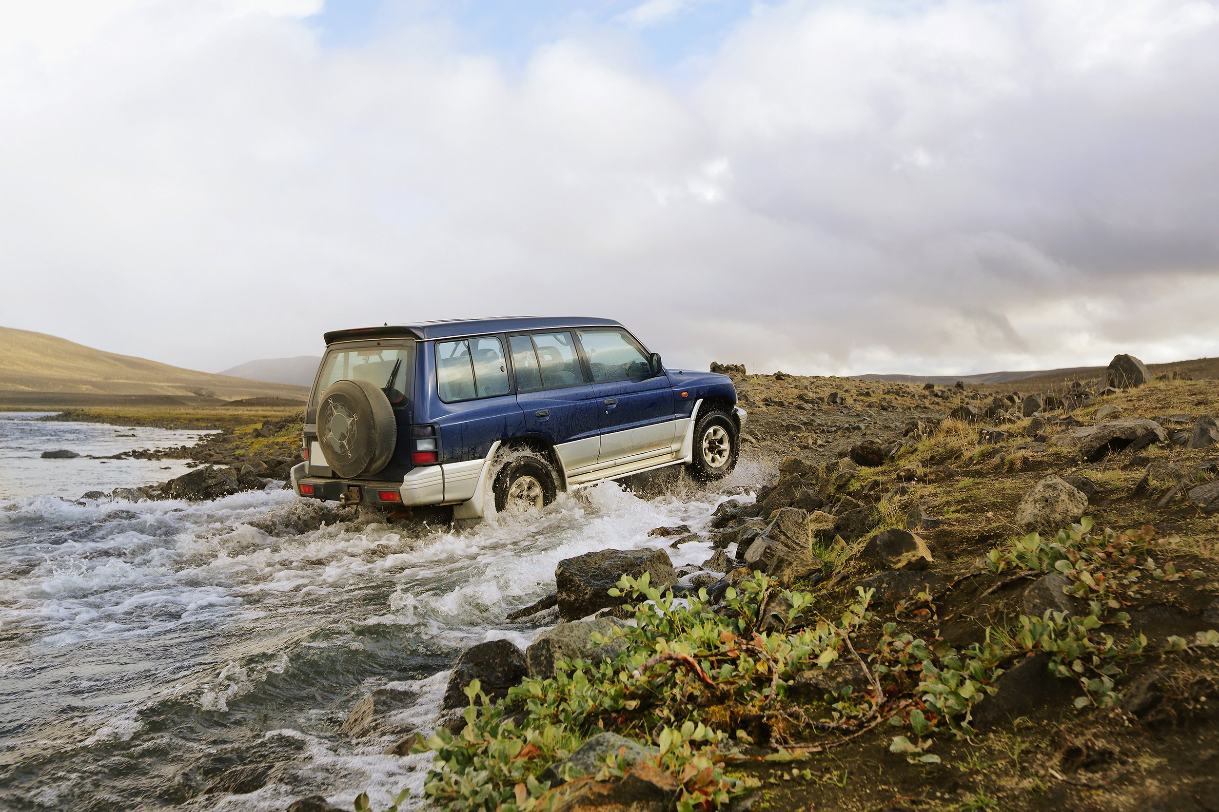 SUV going off roading in Iceland
