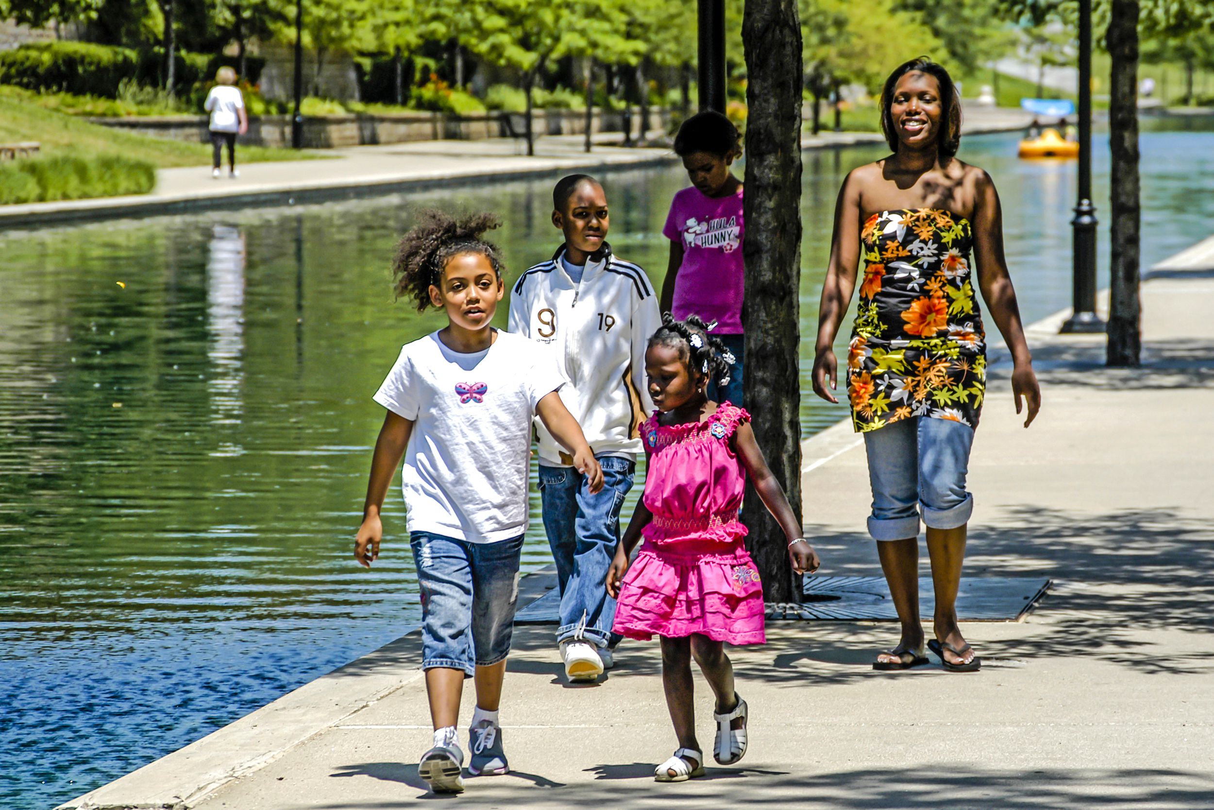 African-American family walking along the canal in the Arts District of Indianapolis, Indiana