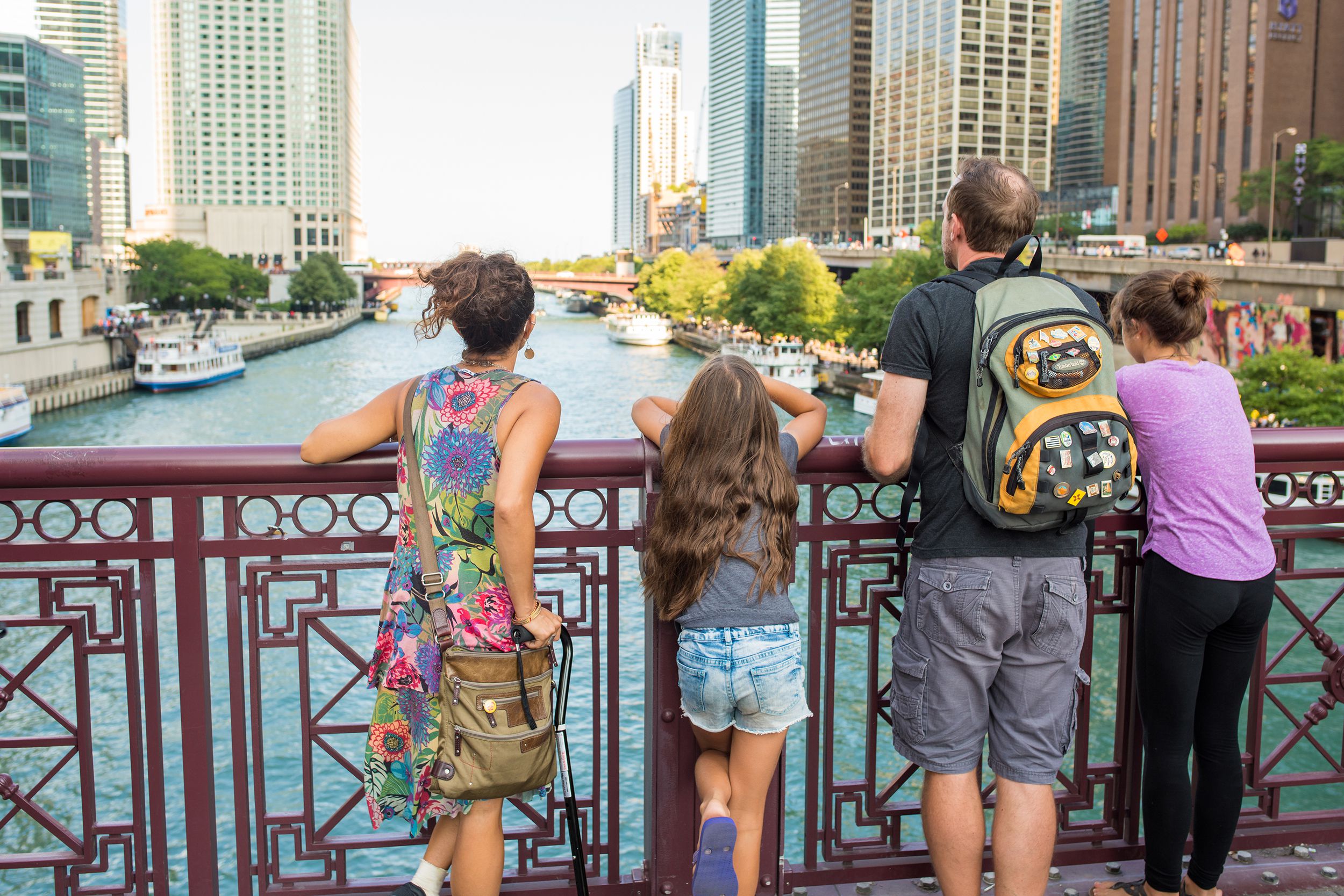 young tourist family enjoying the view downtown Chicago