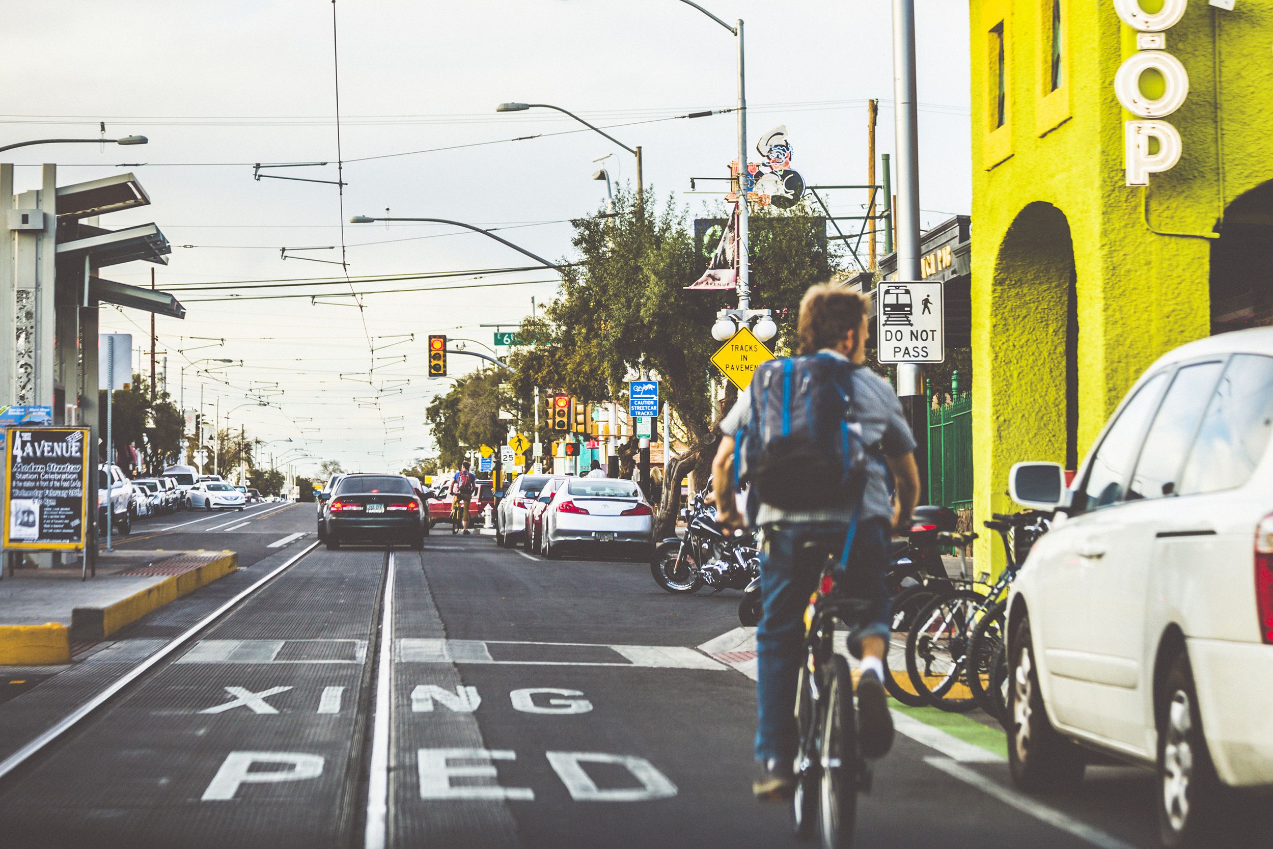man biking down Tucson, Arizona