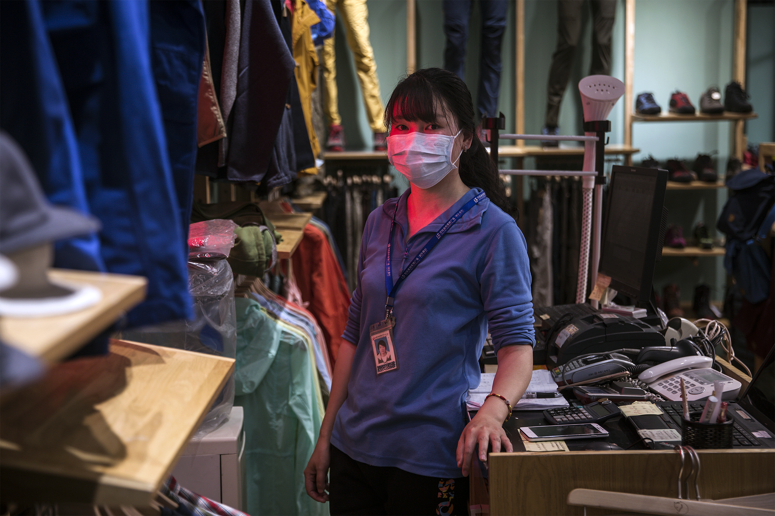 Clothing Store Employee Wearing Mask