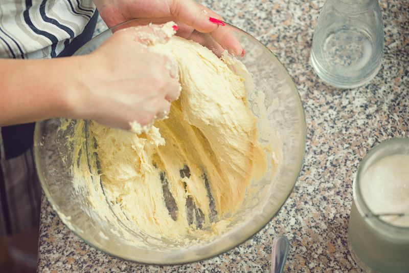 kneading donut dough