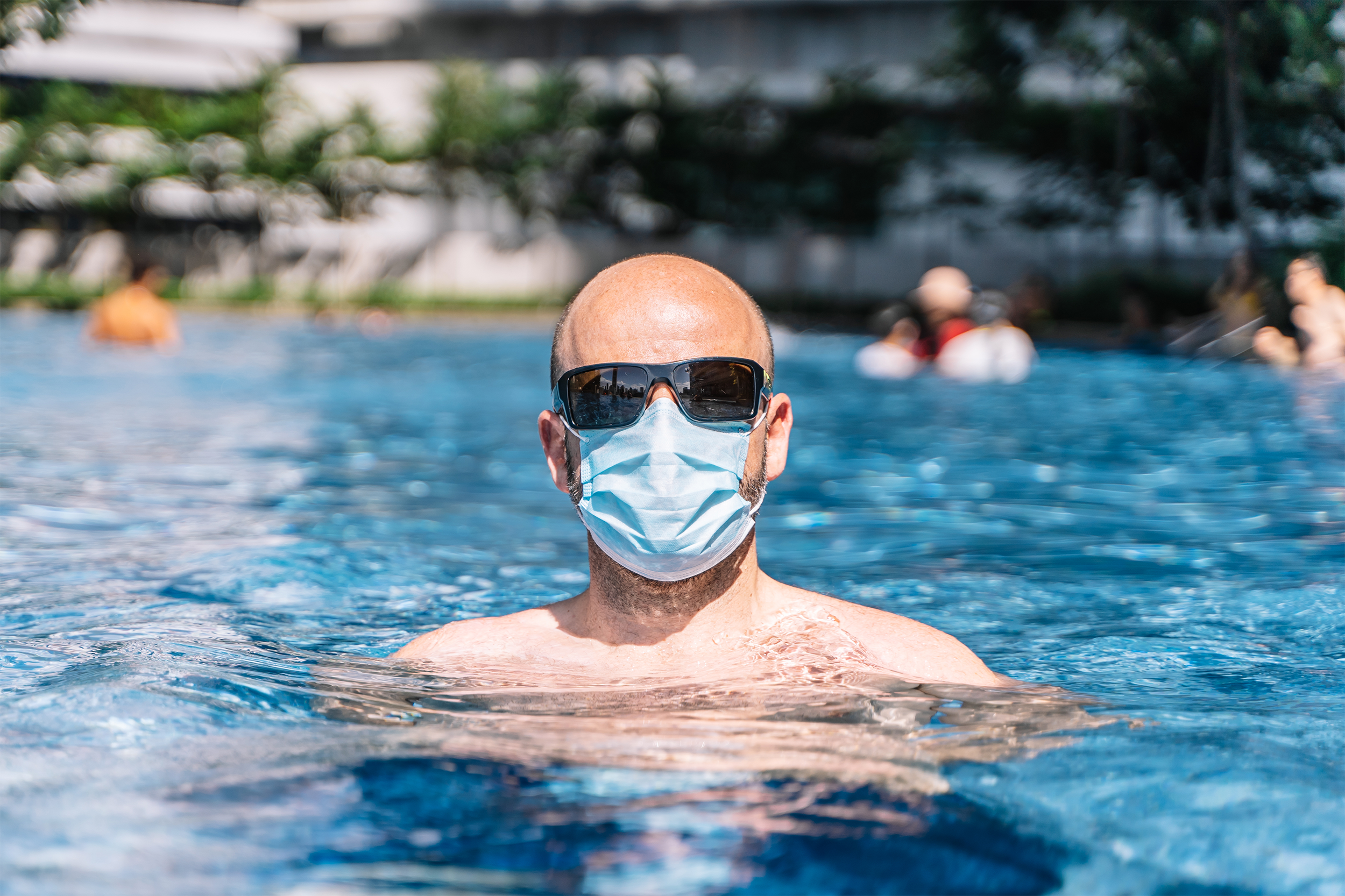 man wearing mask in pool