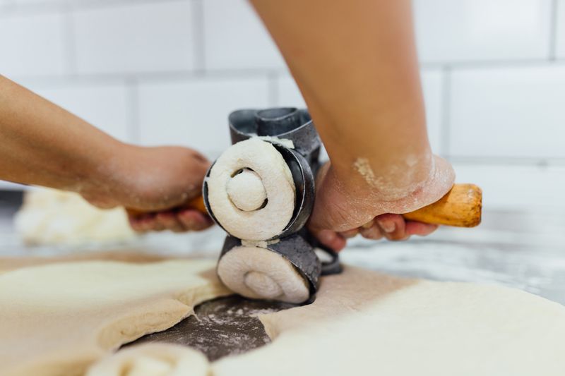 cutting out donuts