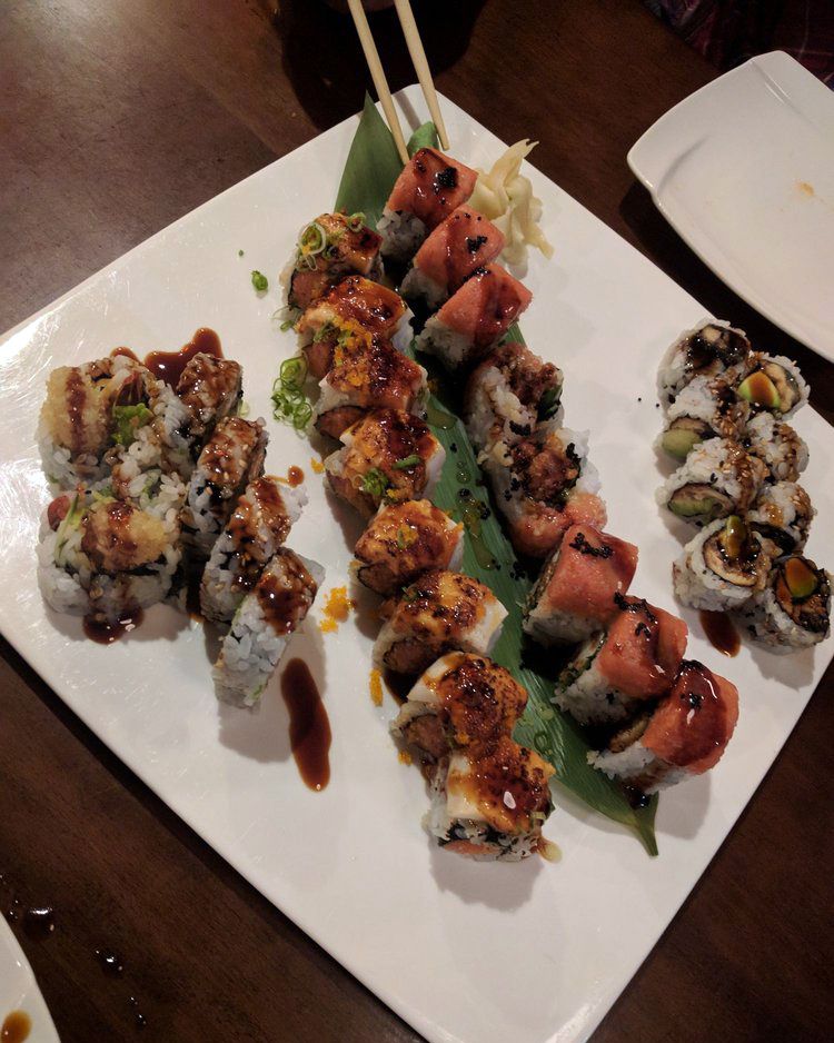 on right shrimp tempura, marilyn monroll, douglas king roll w/o cheese on left eel avo roll