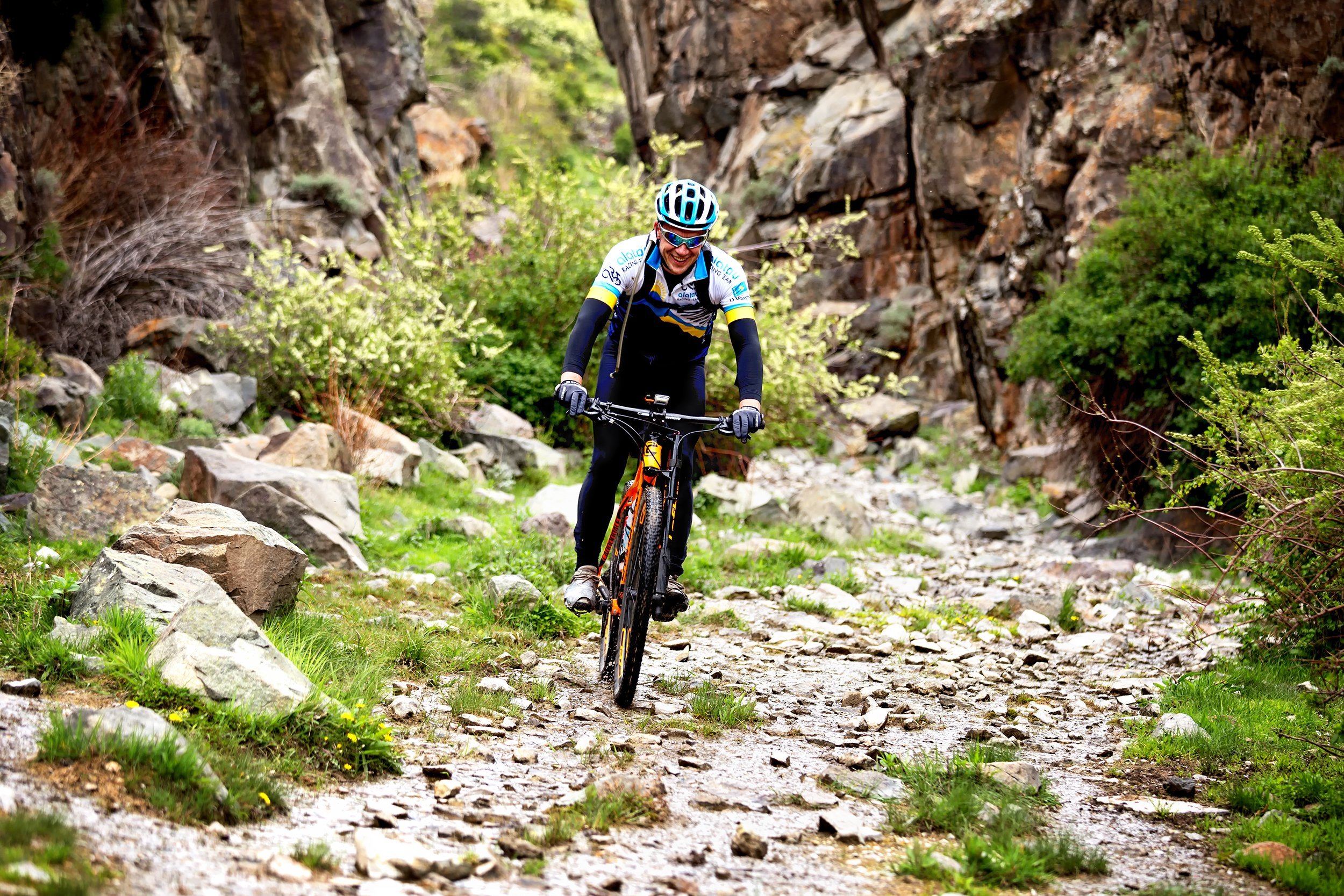 man mountain biking