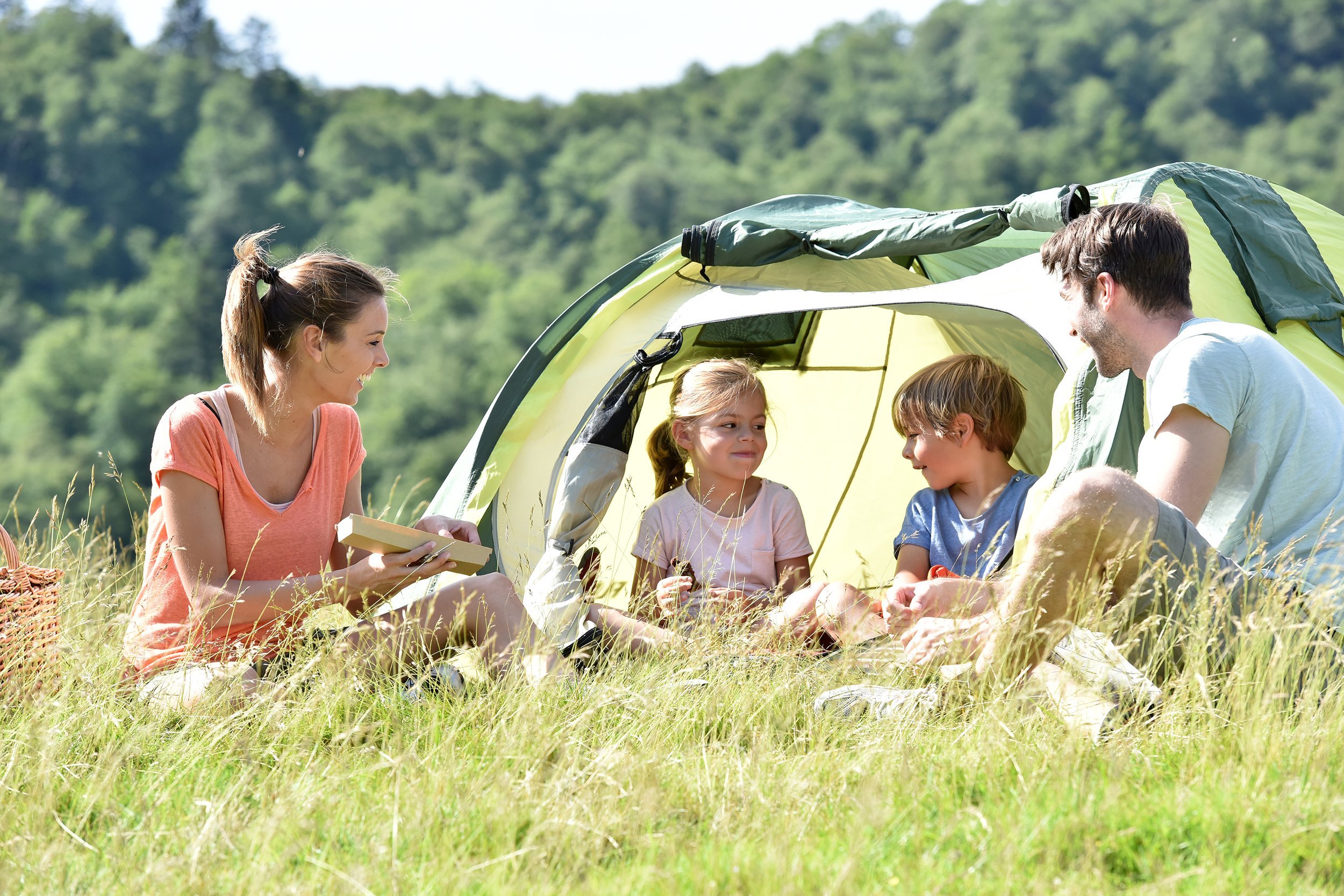 family camping outdoors