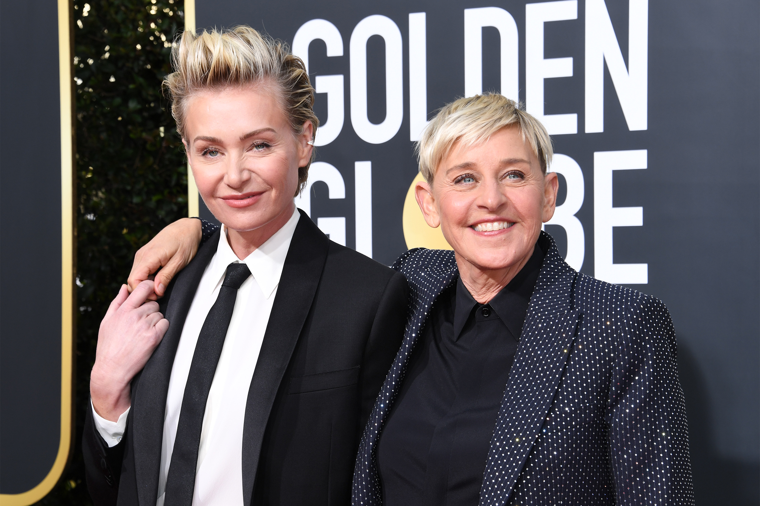 Portia de Rossi and Ellen DeGeneres attend the 77th Annual Golden Globe Awards