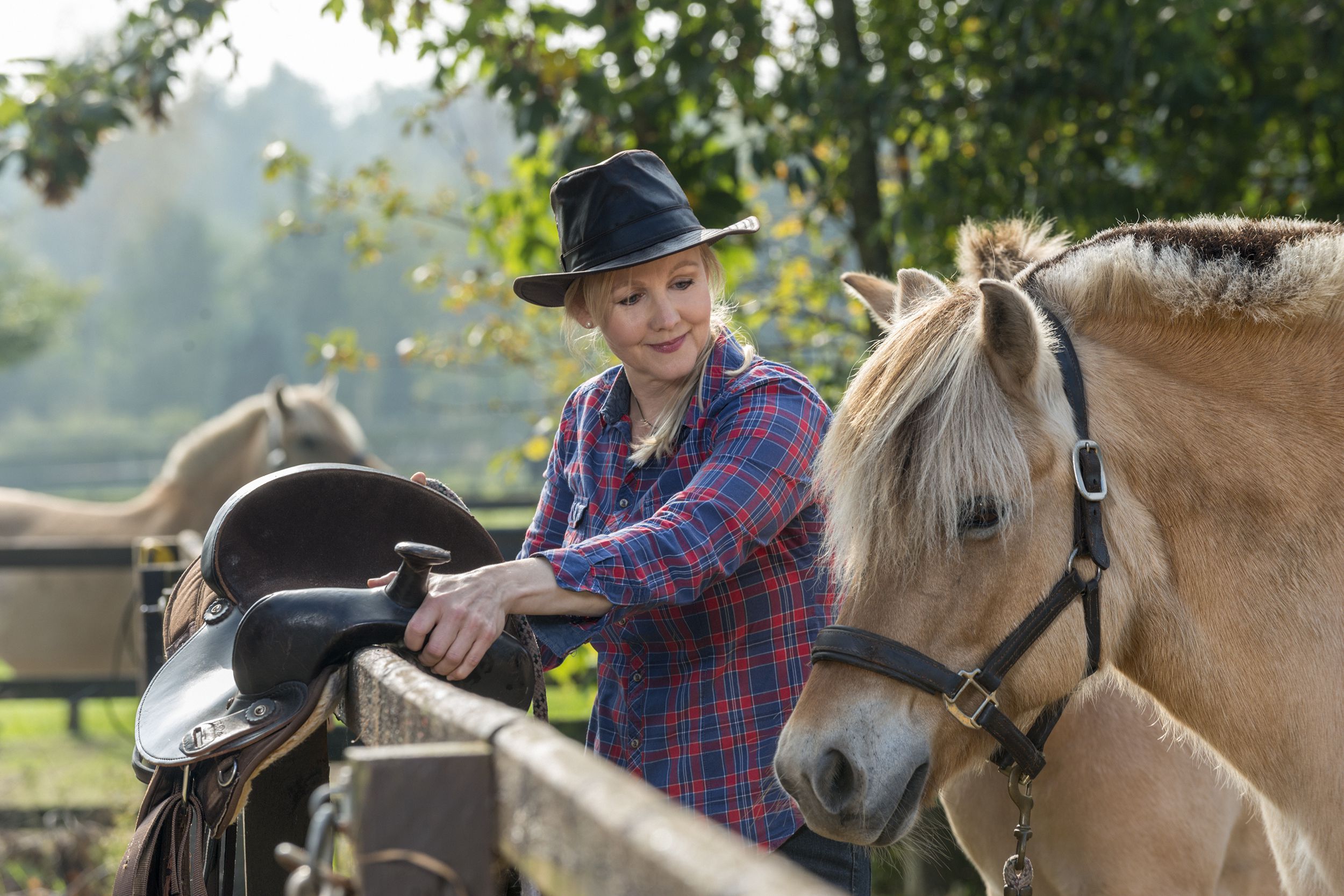 senior woman with her horse