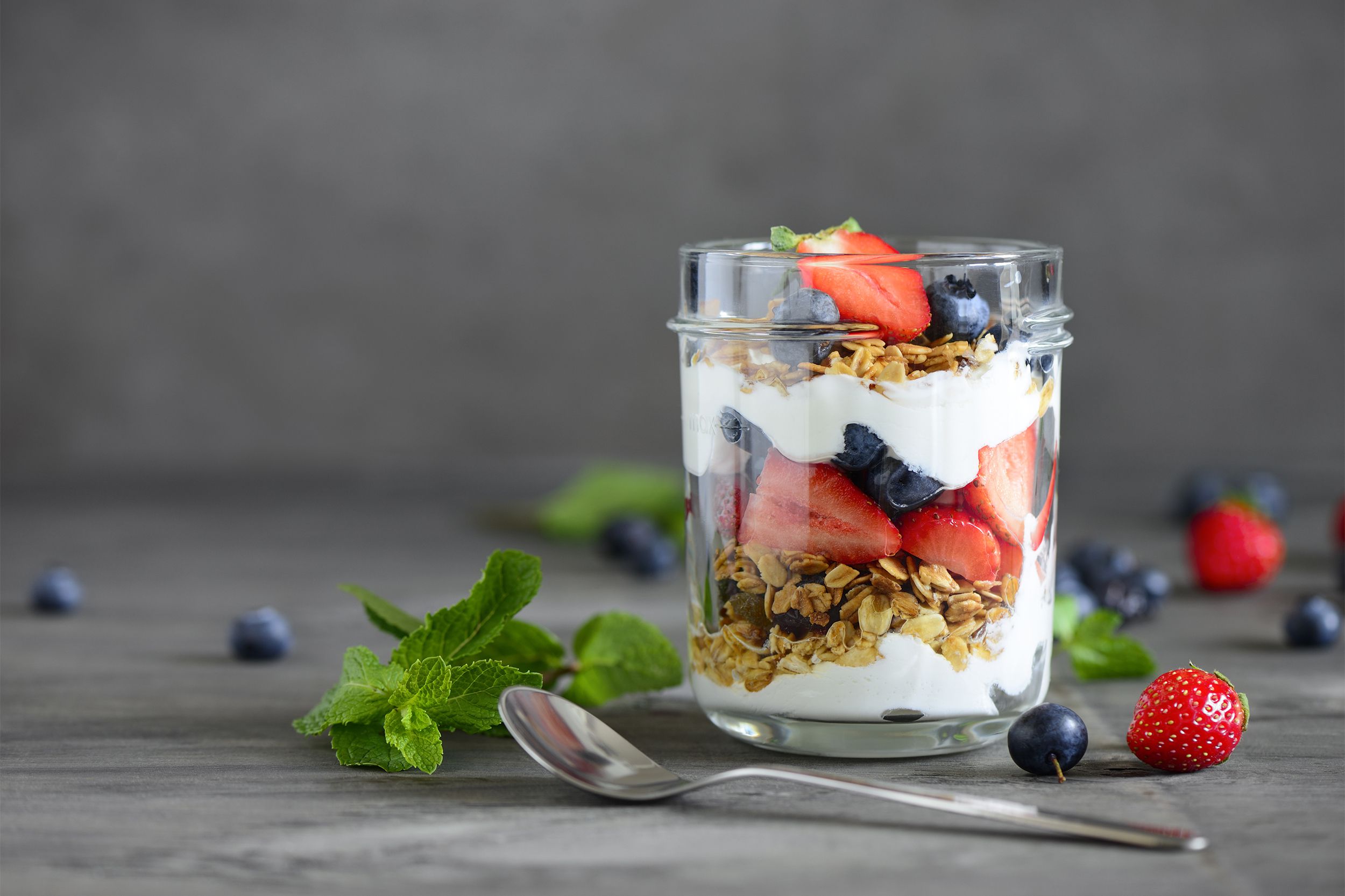 Layered yogurt parfait with fruit and granola