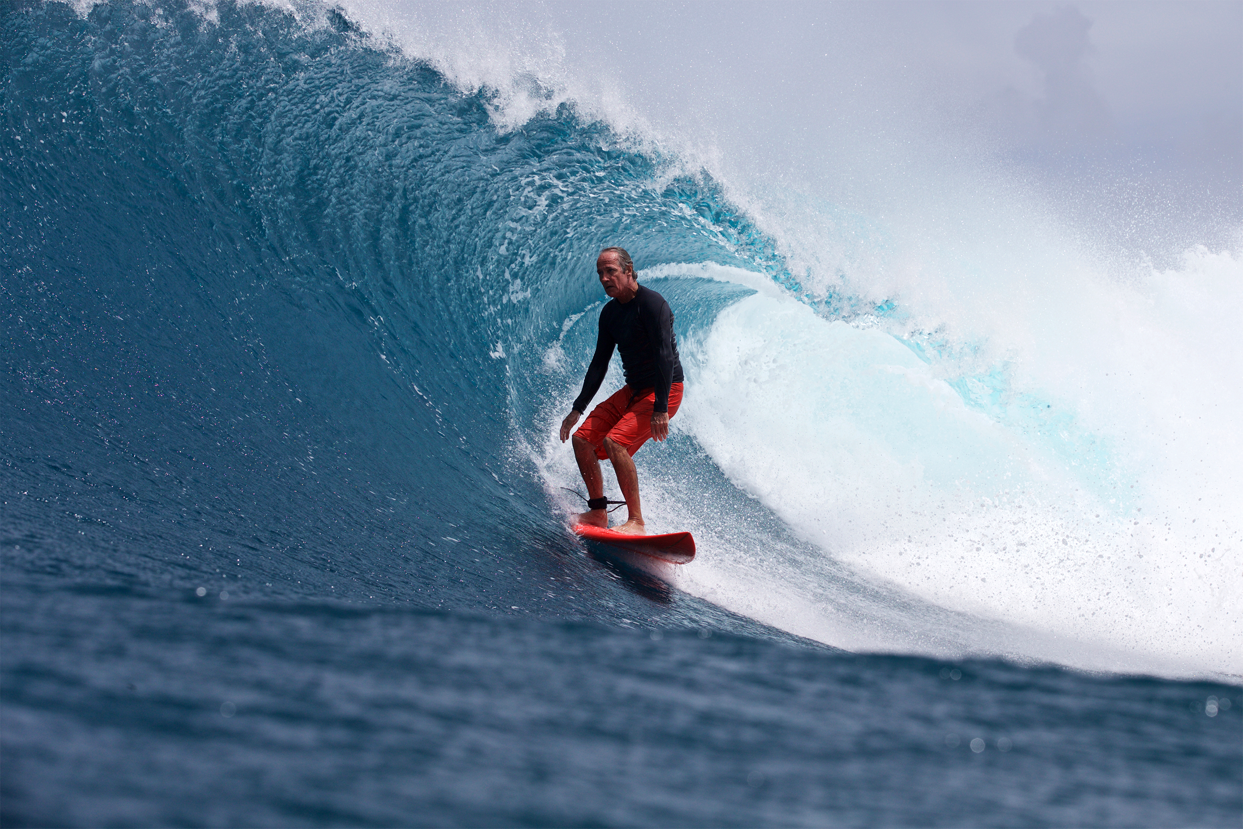senior man surfing