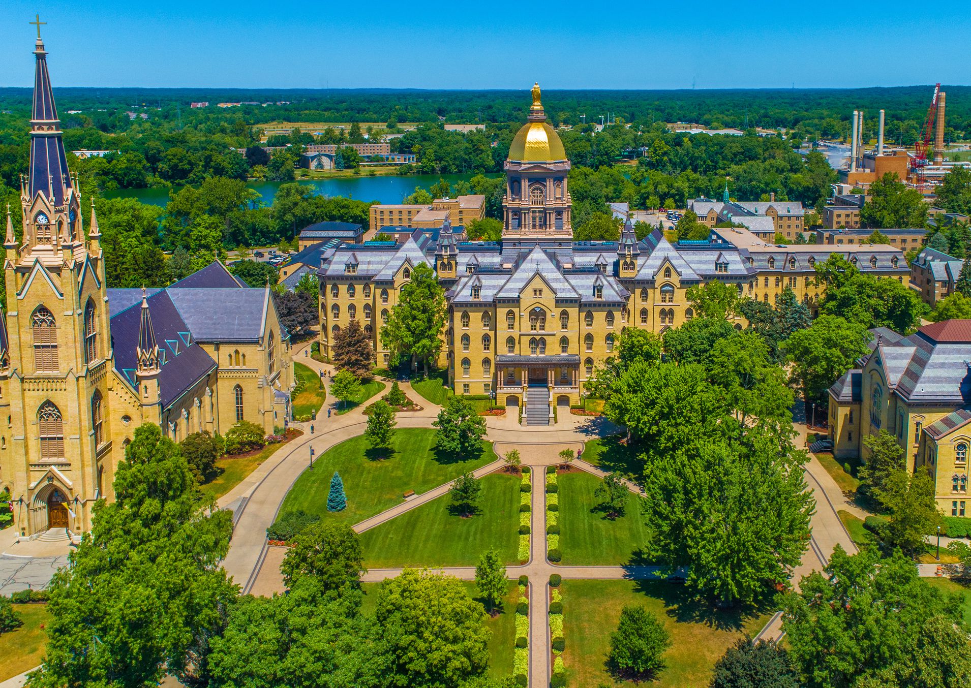 The University of Notre Dame Campus with Golden Dome, Basilica of the Sacred Heart, and Washington Hall.