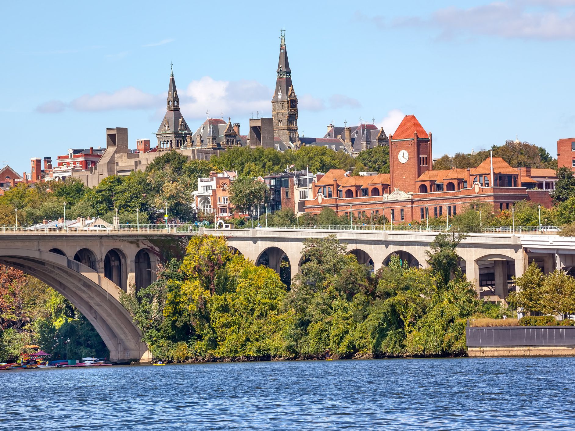 Key Bridge Potomac River Georgetown University Washington DC from Roosevelt Island. Completed in 1923 this is the oldest bridge in Washington DC.