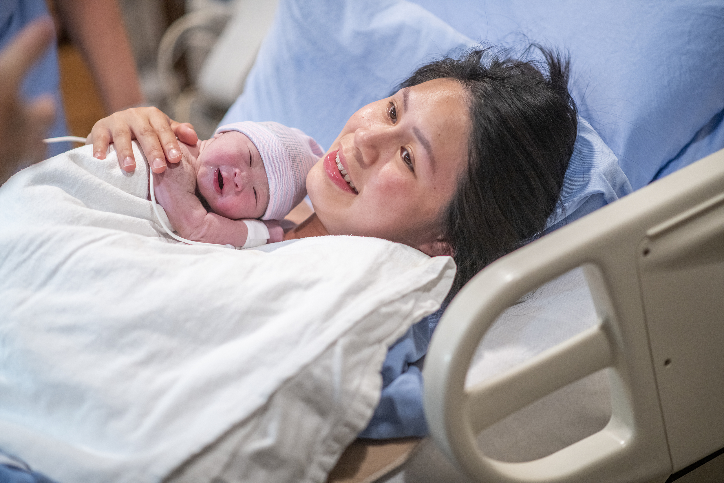 mother with newborn baby after birth