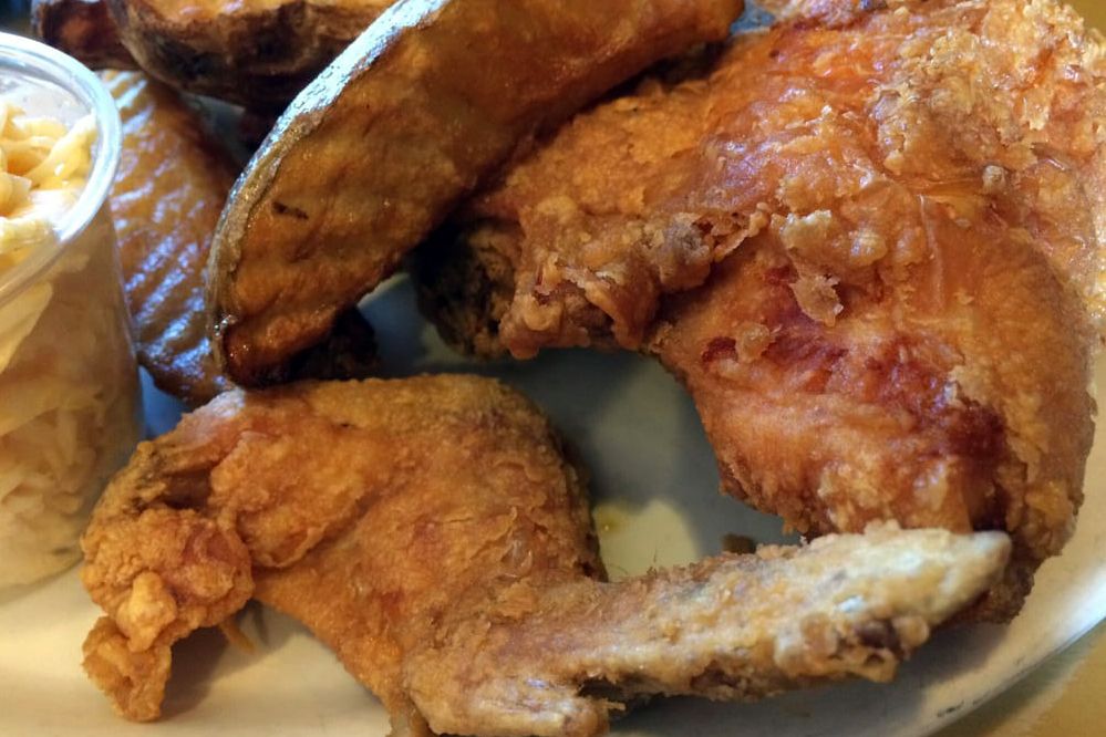 fried chicken and potato wedges from broaster house
