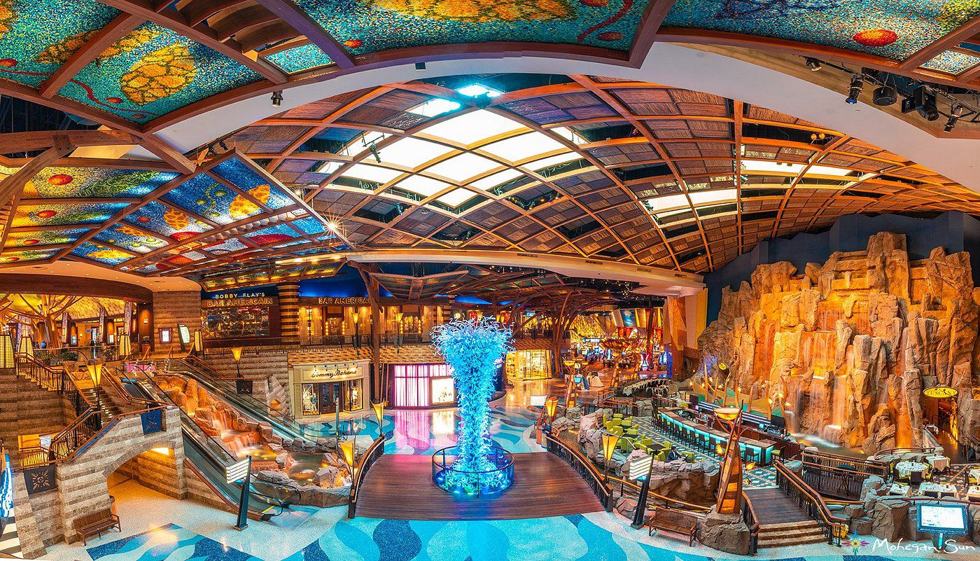 Mohegan Sun, Uncasville, Connecticut, interior with Native American designs developed by the Mohegan tribe, with blue Chihuly sculpture