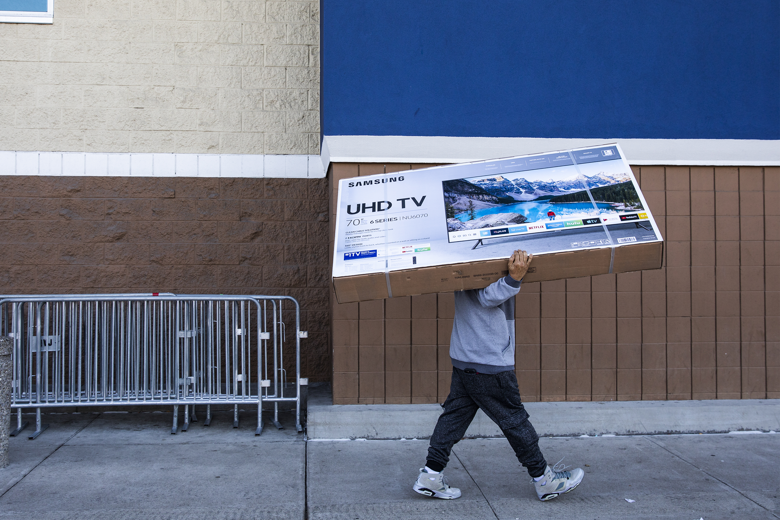 man buying a large tv