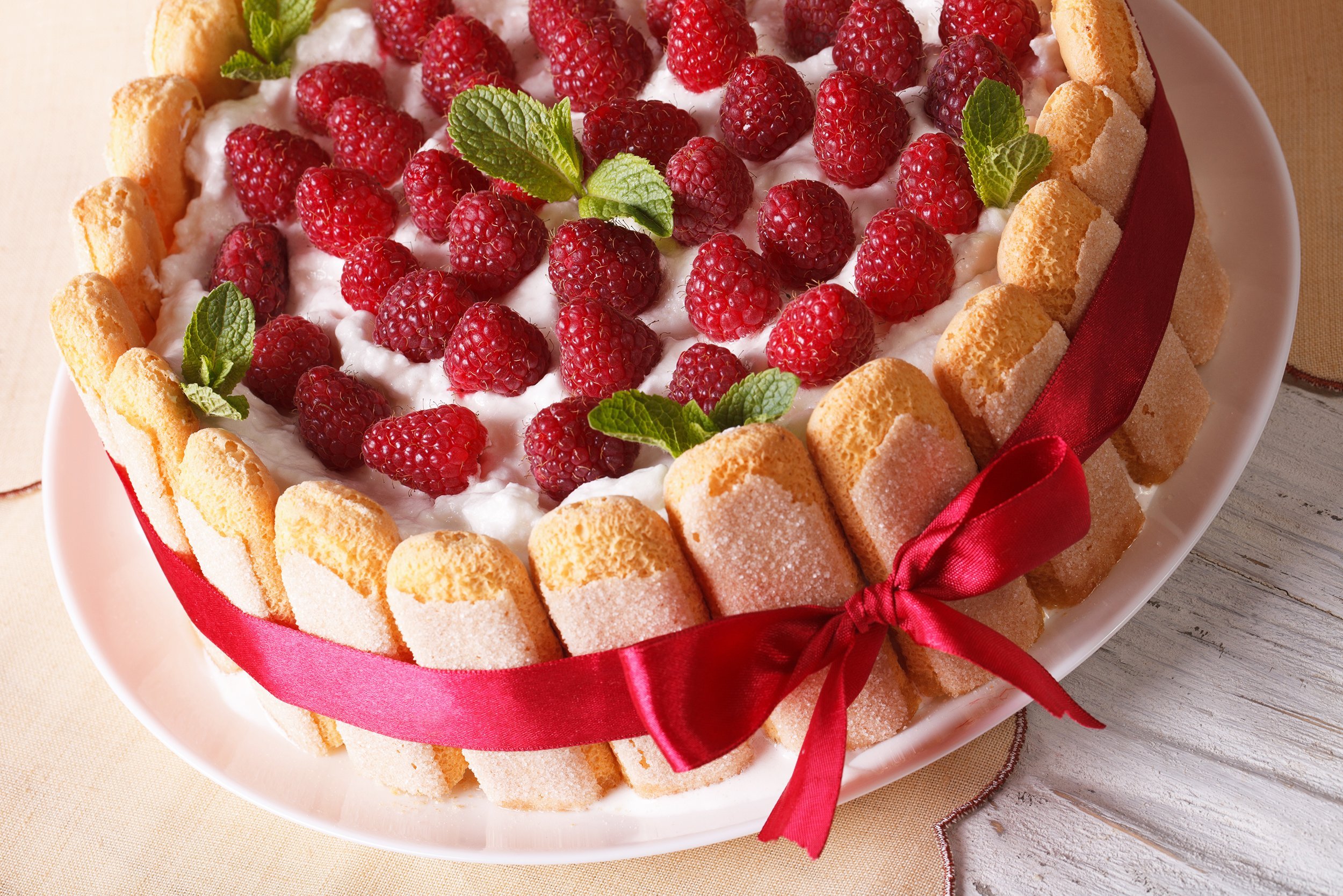 raspberry charlotte cake on table