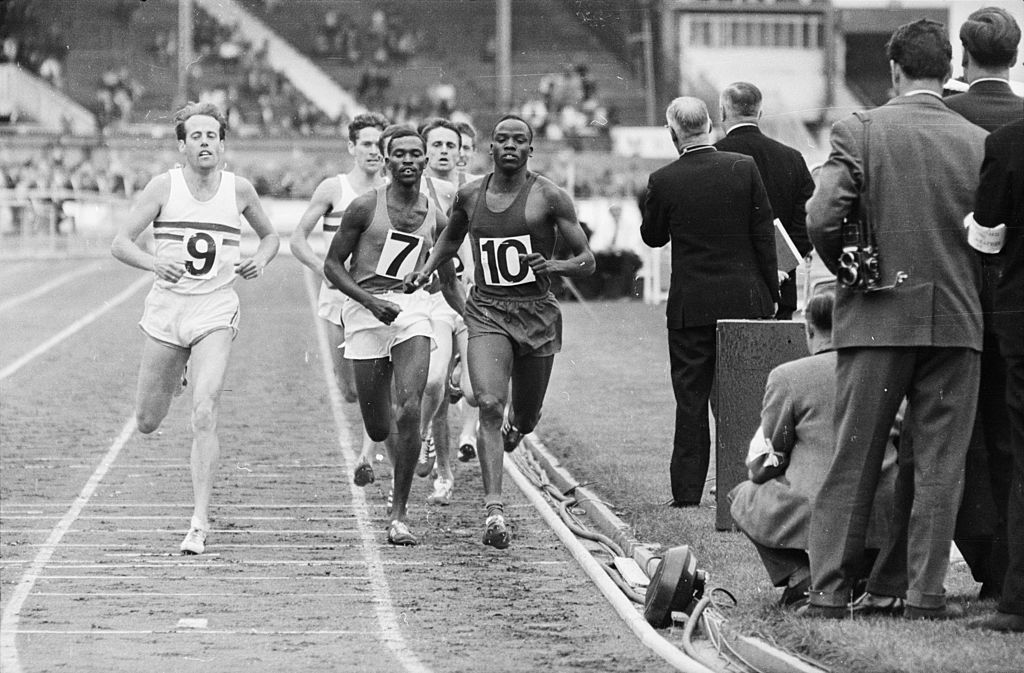 30th August 1965: Kenyan middle-distance runner Kip Keino wins the mile race from Alan Simpson and Czechoslovakian athlete Josef Odlozil at a meeting between Great Britain and Czechoslovakia