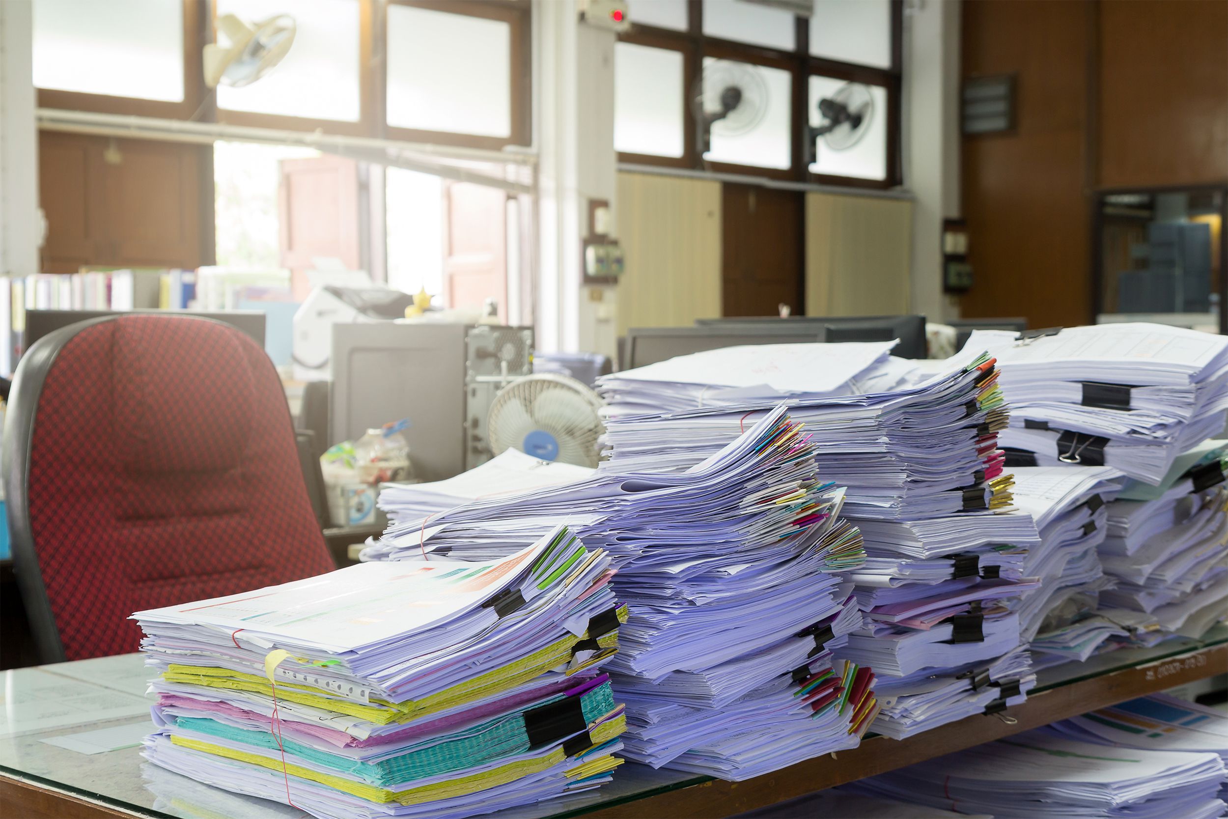 stack of papers on a desk