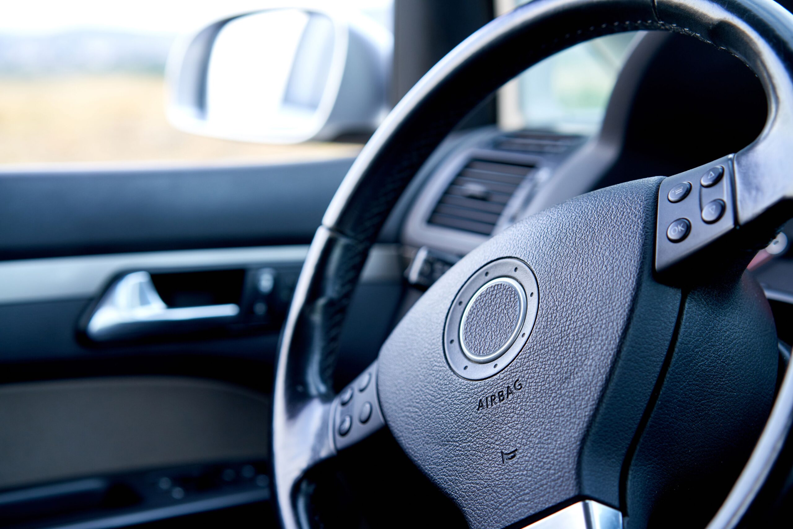 Close up of steering wheel with airbag