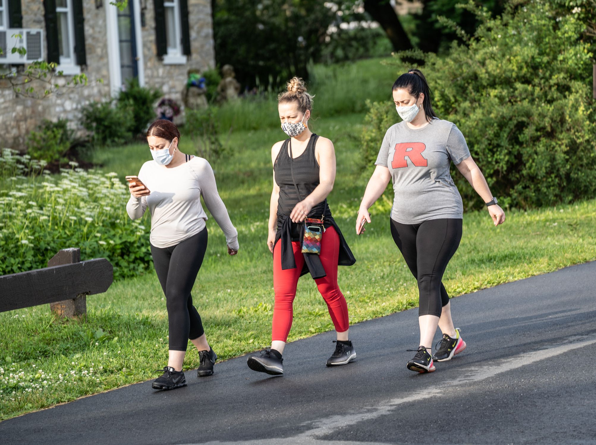 friends walking in park
